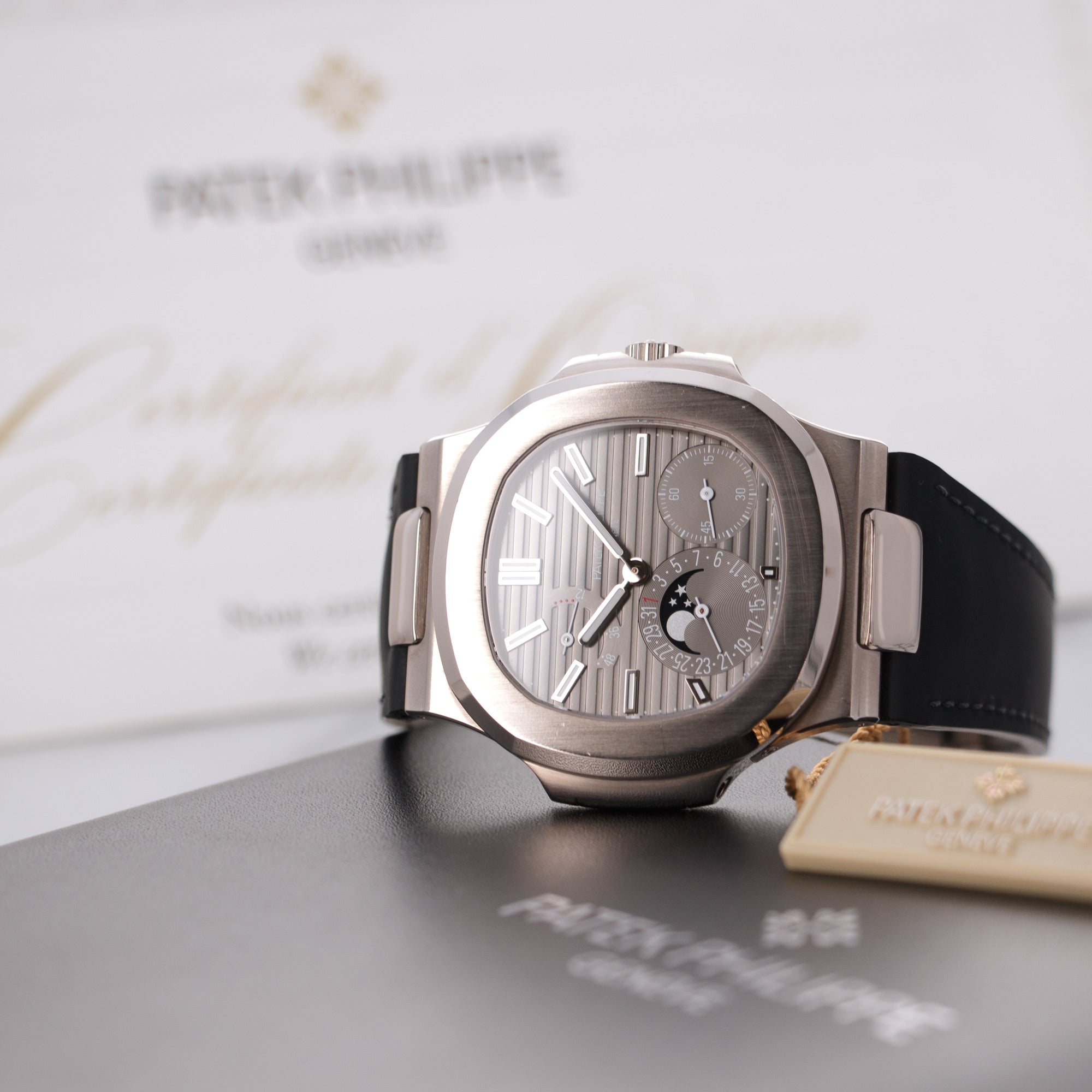 Patek Philippe - Patek Philippe White Gold Nautilus Moonphase Watch Ref. 5712 - The Keystone Watches