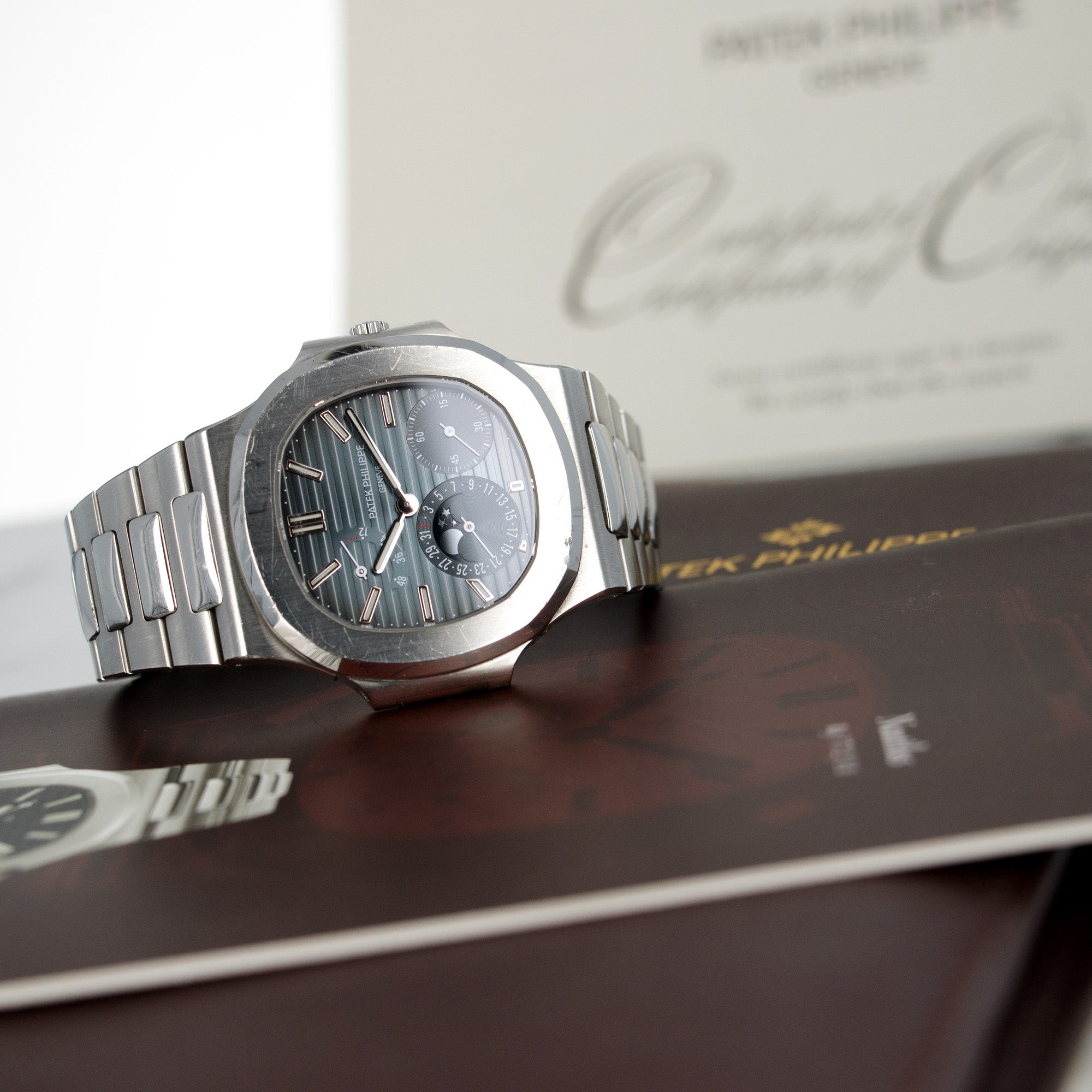 Patek Philippe - Patek Philippe Nautilus Moonphase Watch Ref. 3712 with Original Box and Papers - The Keystone Watches