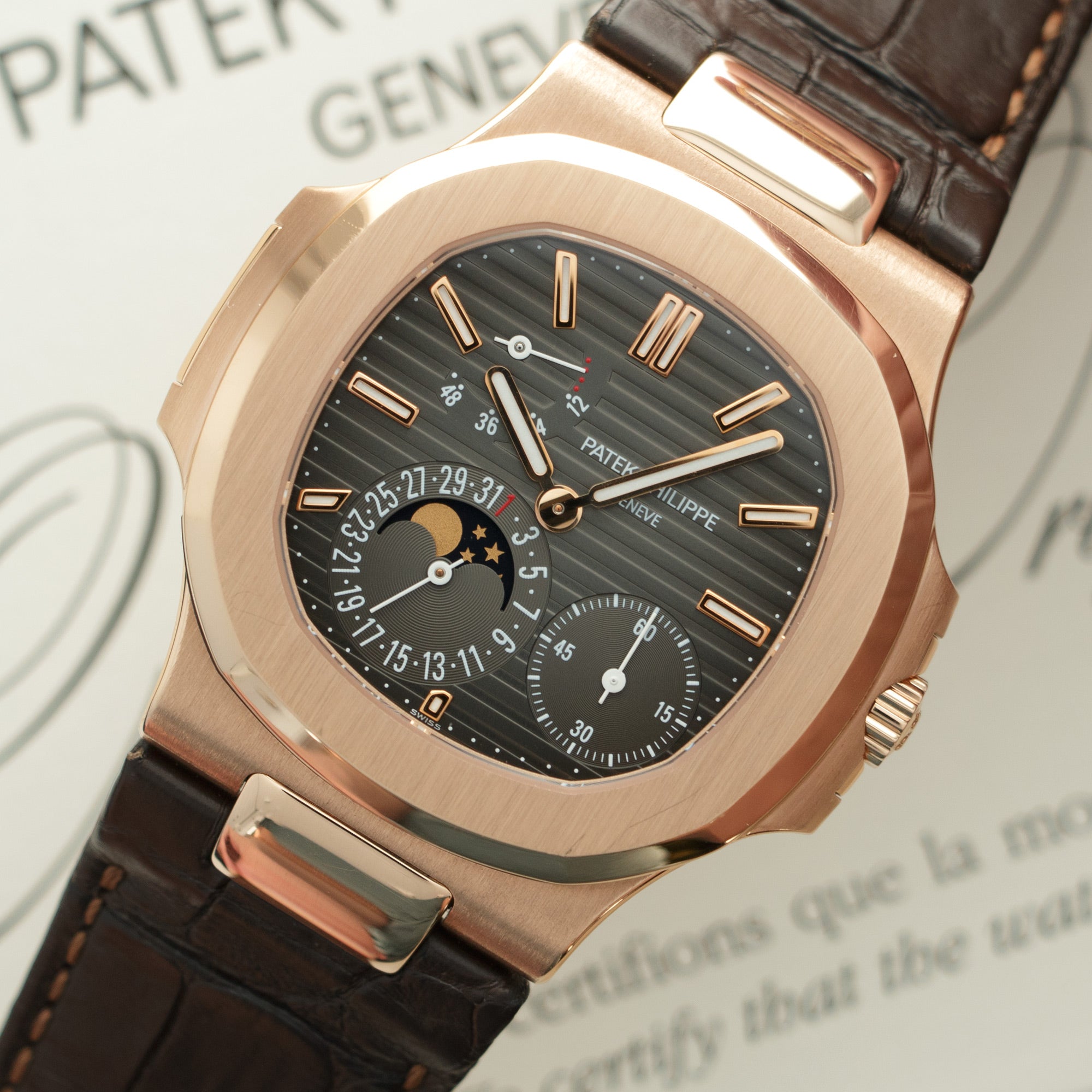 Patek Philippe - Patek Philippe Rose Gold Nautilus Moonphase Watch Ref. 5712 - The Keystone Watches
