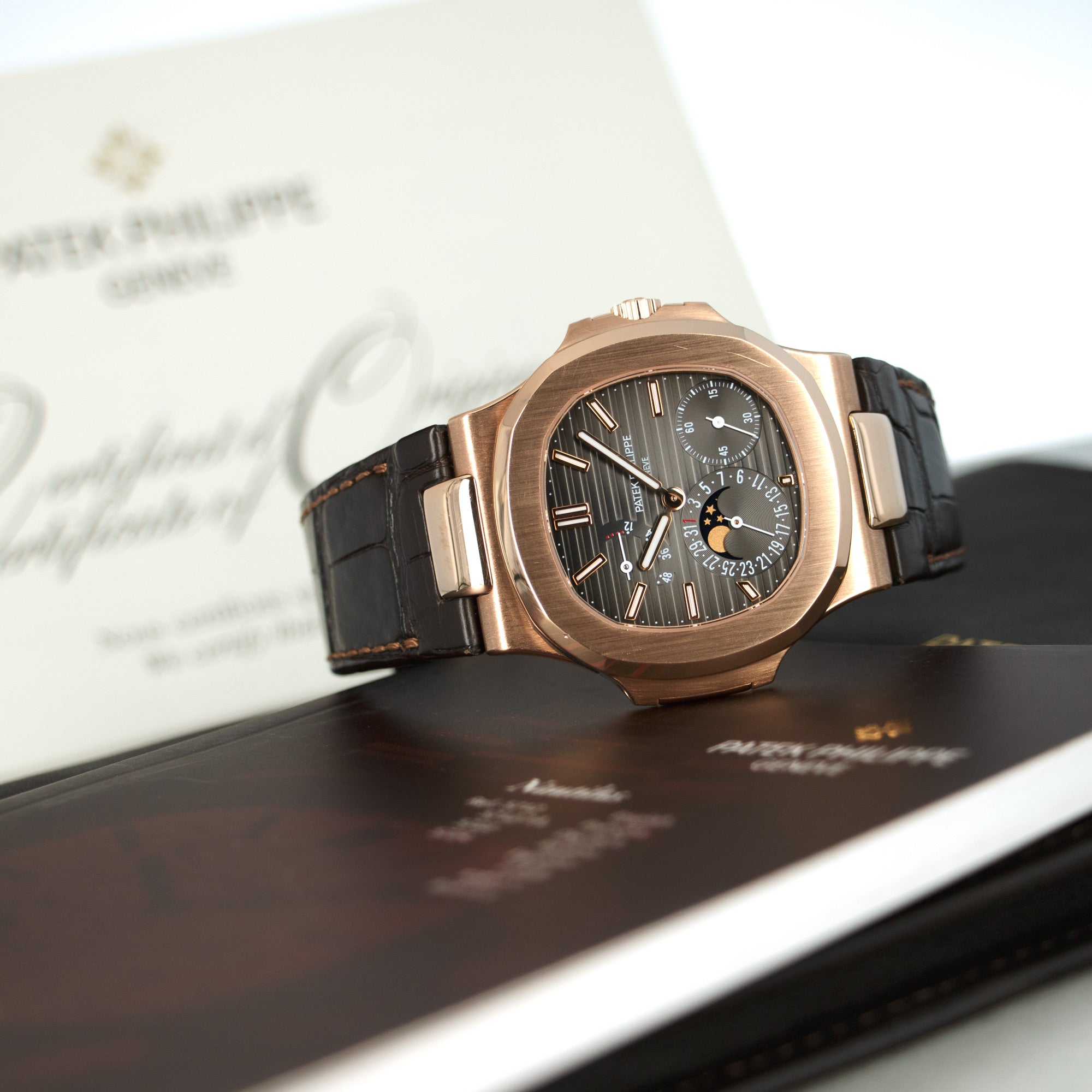 Patek Philippe - Patek Philippe Rose Gold Nautilus Moonphase Watch Ref. 5712 - The Keystone Watches