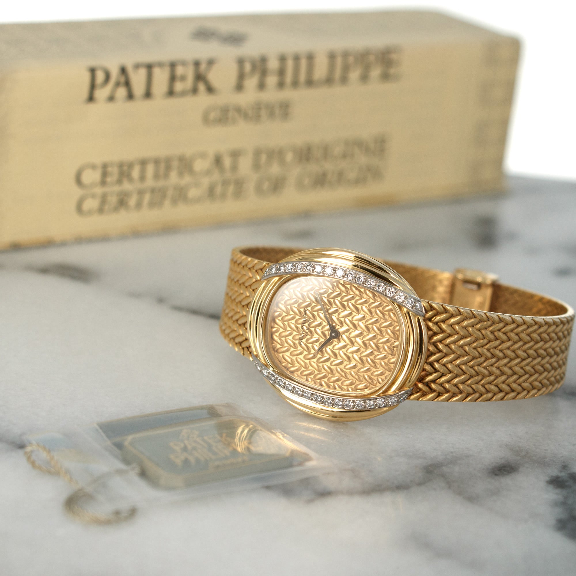 Patek Philippe - Patek Philippe Yellow Gold Diamond Watch Ref. 4288 with Original Paper - The Keystone Watches