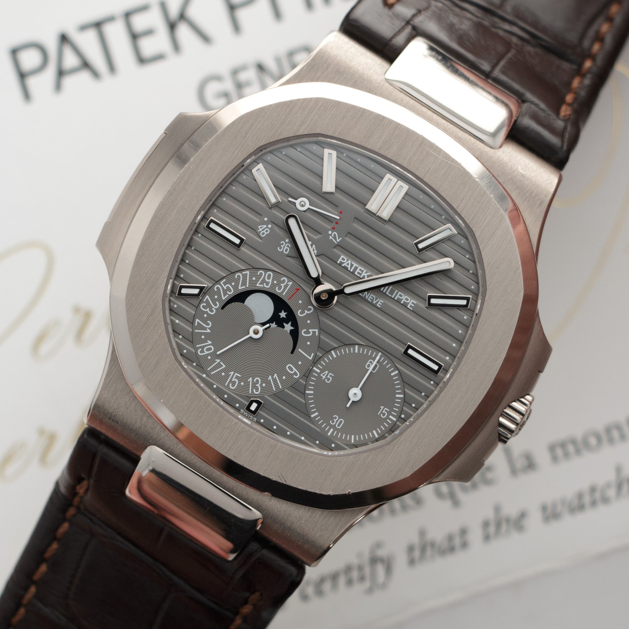 Patek Philippe - Patek Philippe White Gold Nautilus Moonphase Watch Ref. 5712 - The Keystone Watches