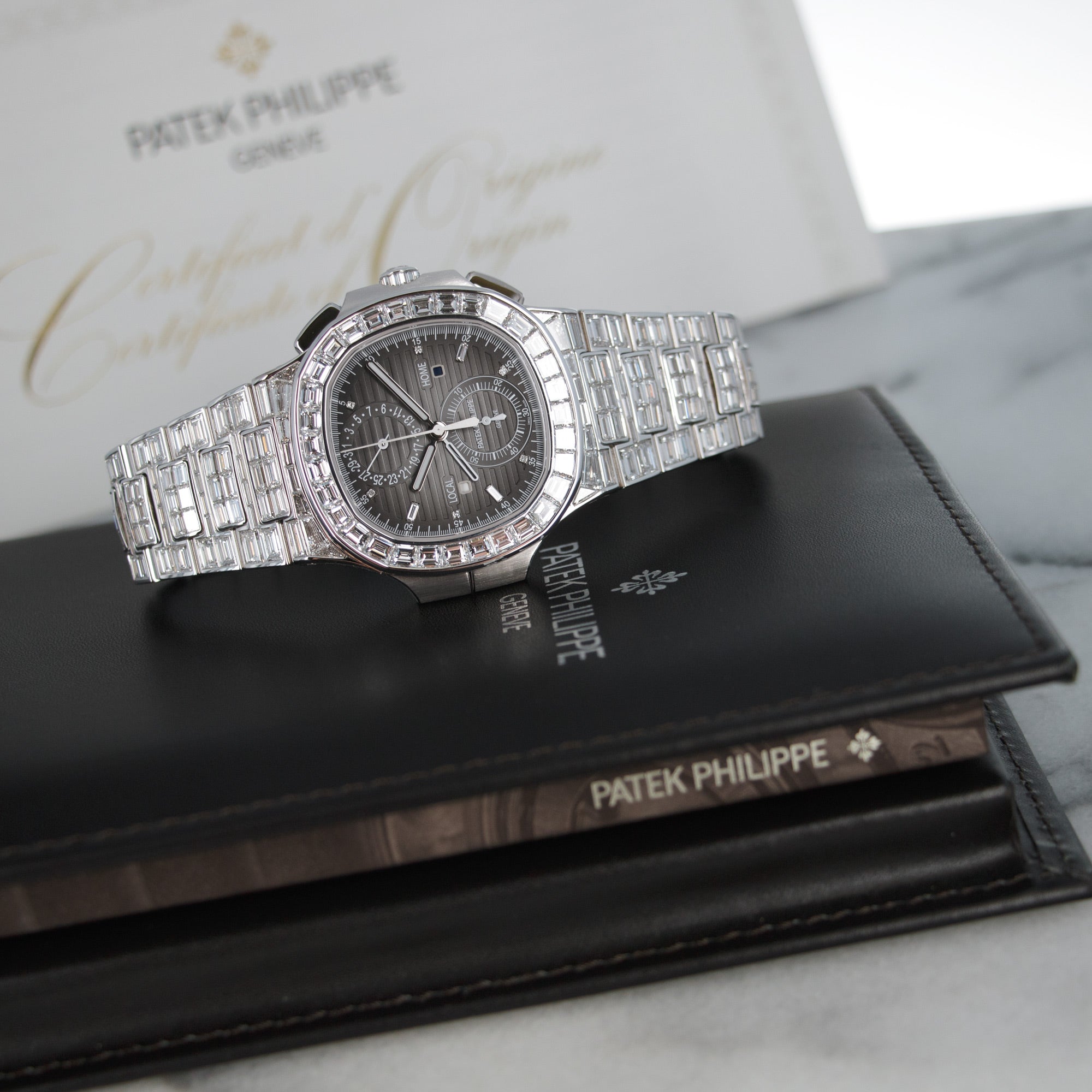 Patek Philippe - Patek Philippe White Gold Nautilus Baguette Diamond Watch Ref. 5990, Special Edition - The Keystone Watches