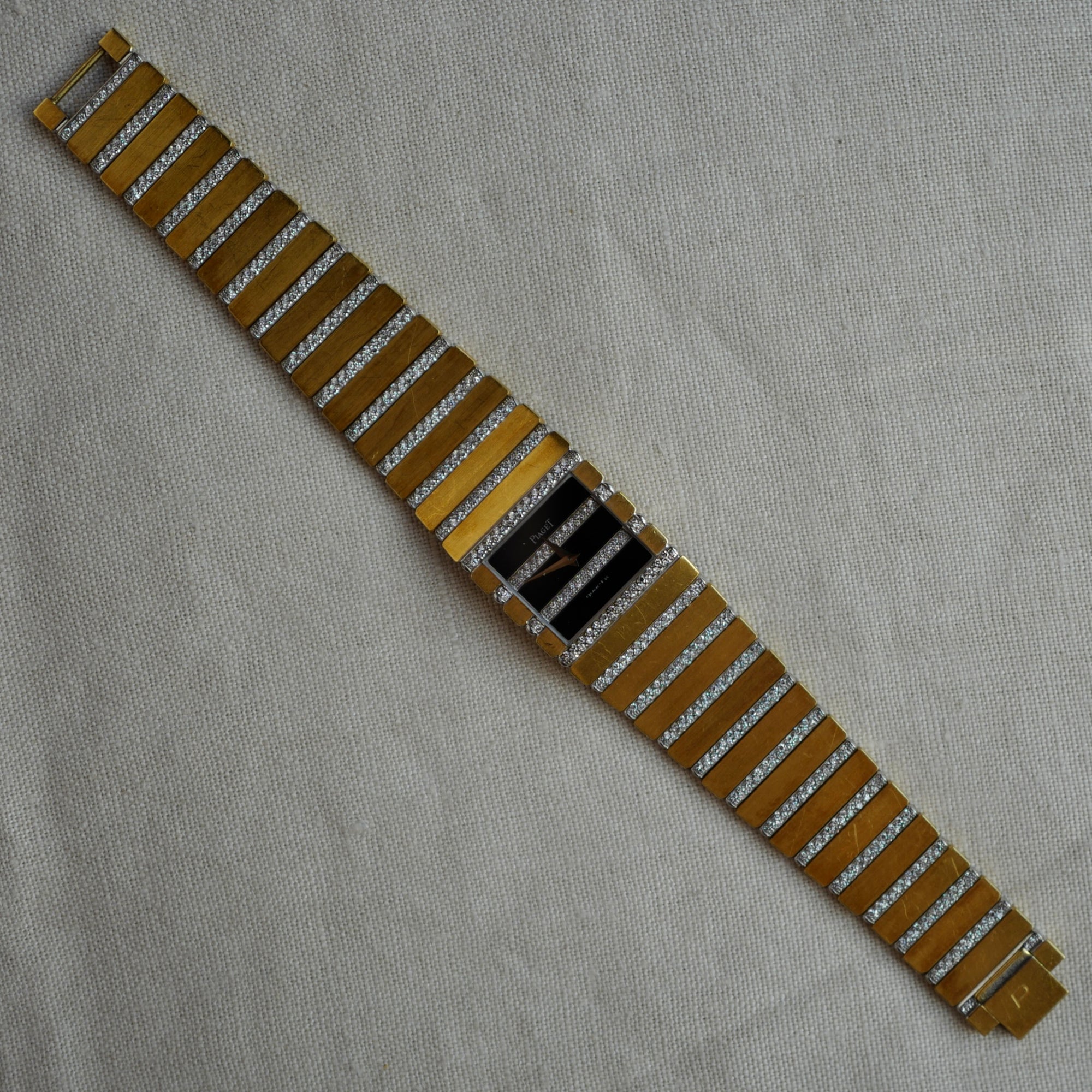 Piaget - Piaget White Gold and Yellow Gold Watch with Black and Diamond Dial Ref. 7131 - The Keystone Watches