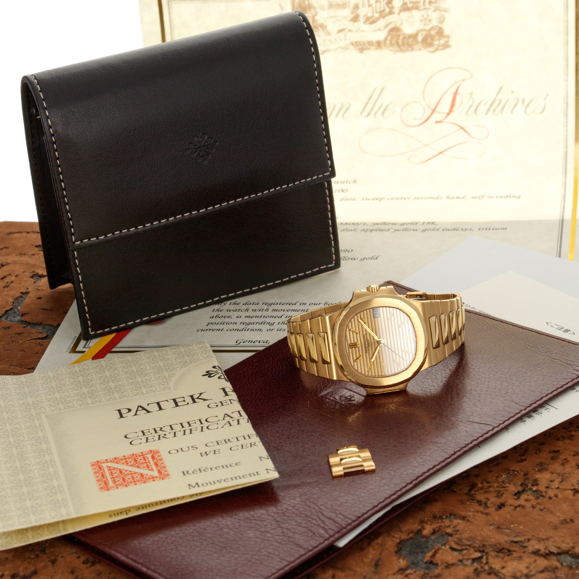 Patek Philippe - Patek Philippe Yellow Gold Nautilus Ref. 3800 with Box and Papers - The Keystone Watches