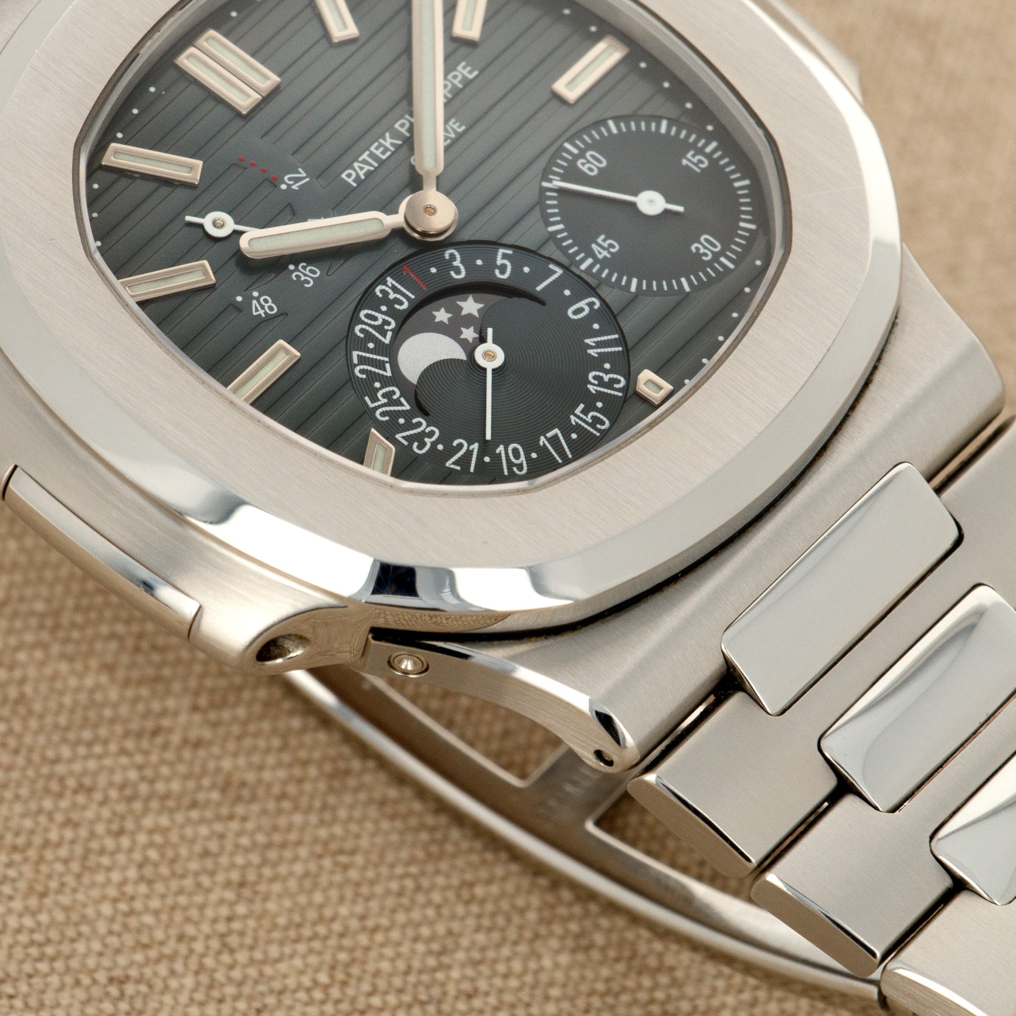 Patek Philippe - Patek Philippe Nautilus Moonphase Watch Ref. 5712 with Original Box and Papers - The Keystone Watches