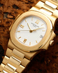 Patek Philippe - Patek Philippe Yellow Gold Nautilus Watch Ref. 3800 with Rare White Roman Numerals Dial - The Keystone Watches