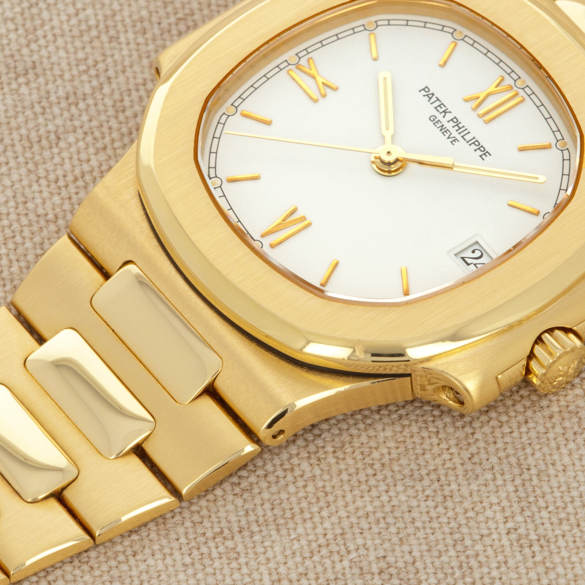 Patek Philippe - Patek Philippe Yellow Gold Nautilus Watch Ref. 3800 with Rare White Roman Numerals Dial - The Keystone Watches