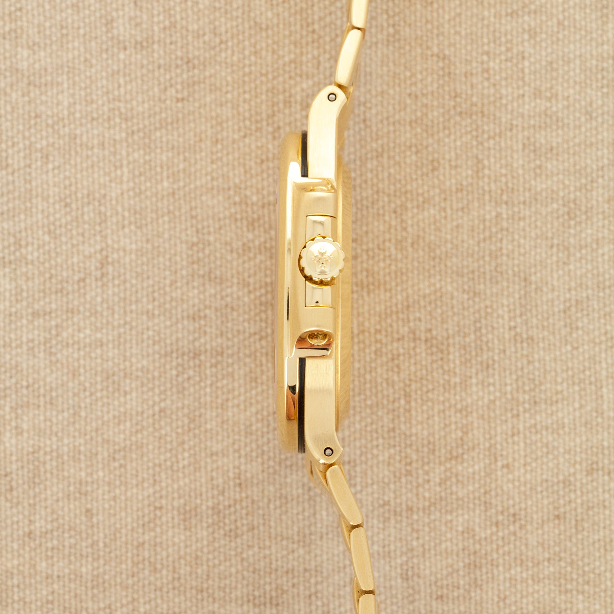 Patek Philippe - Patek Philippe Yellow Gold Nautilus Watch Ref. 3800 with Rare White Roman Numerals Dial - The Keystone Watches