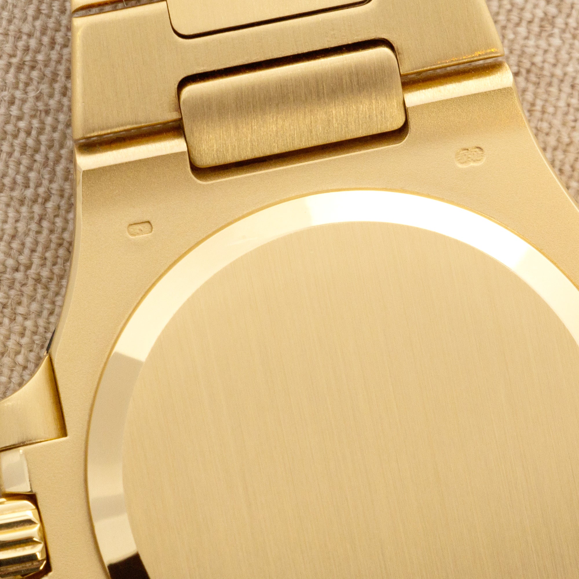 Patek Philippe - Patek Philippe Yellow Gold Nautilus Watch Ref. 3800 with Rare White Roman Numerals Dial - The Keystone Watches