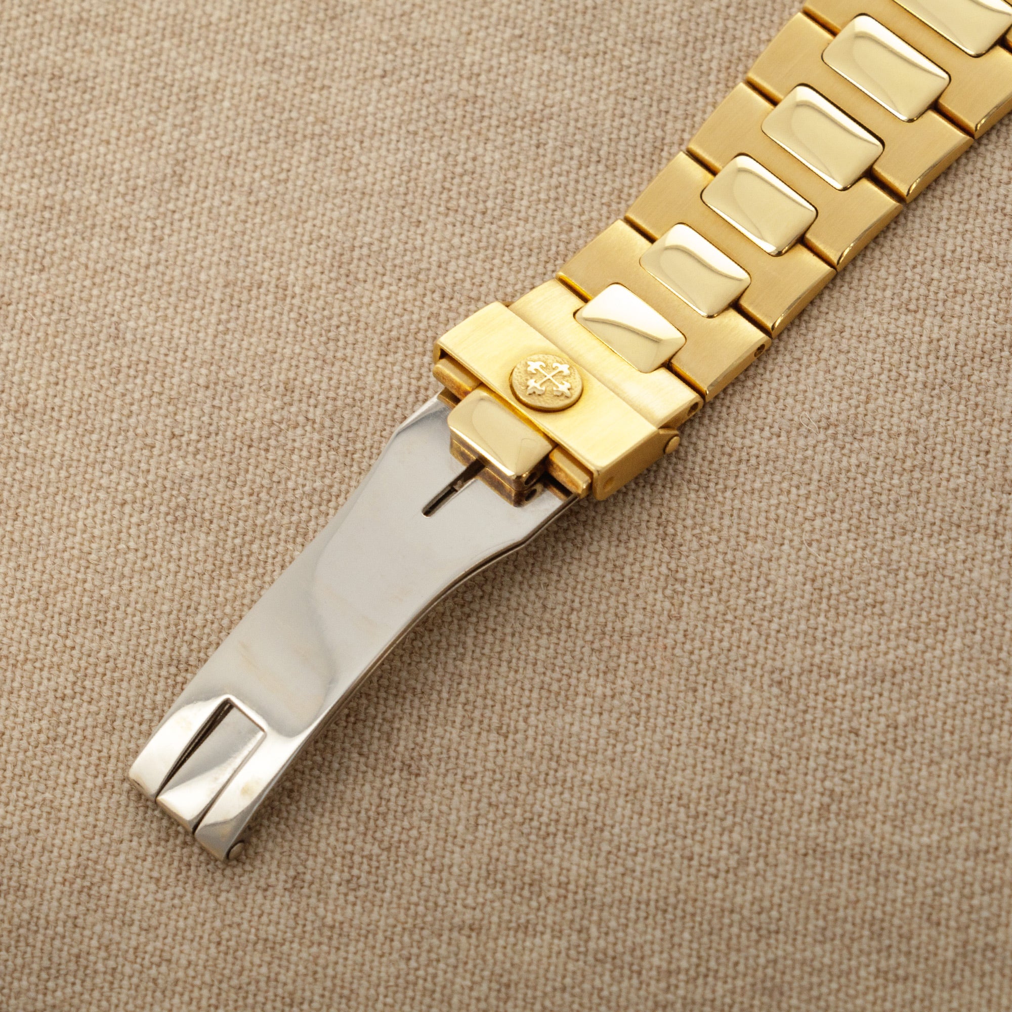 Patek Philippe - Patek Philippe Yellow Gold Nautilus Watch Ref. 3800 with Rare White Roman Numerals Dial - The Keystone Watches