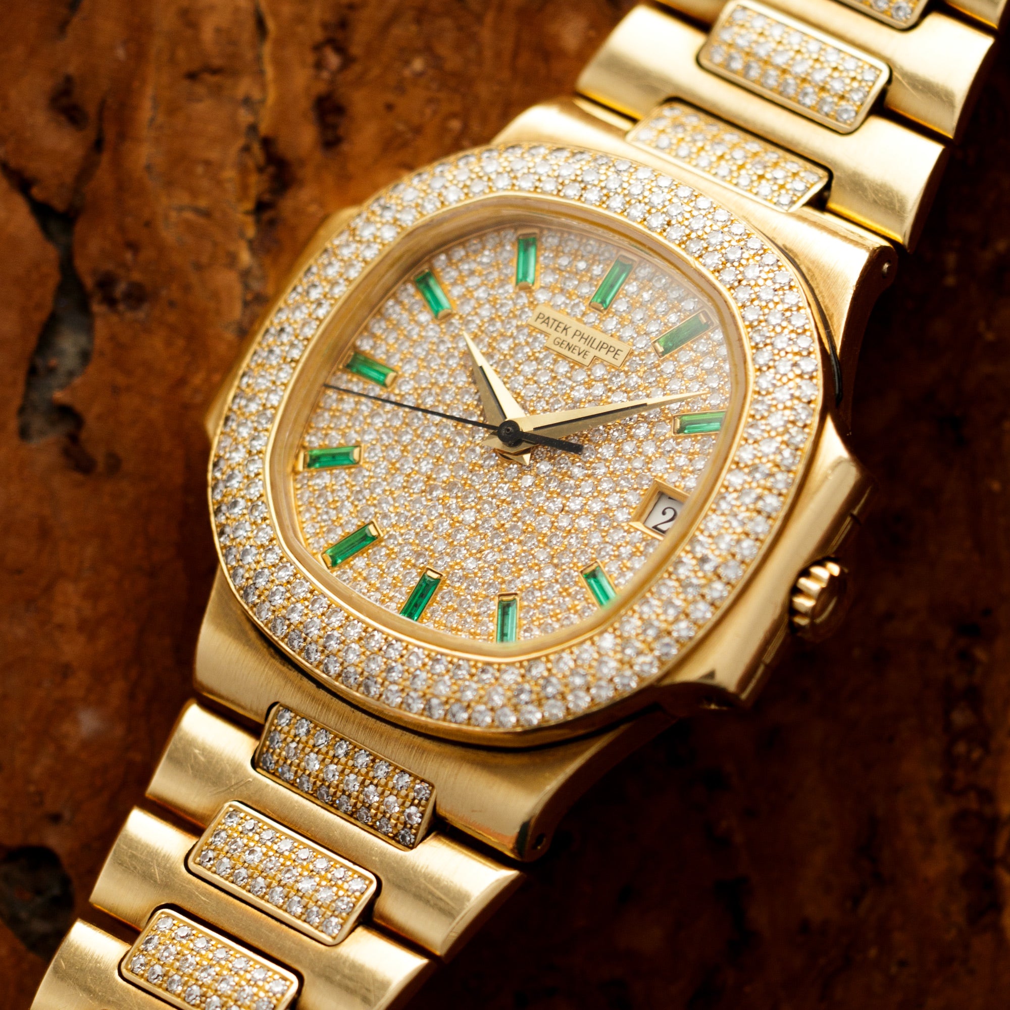 Patek Philippe - Patek Philippe Yellow Gold Nautilus Diamond Emerald Watch Ref. 3800/5 - The Keystone Watches