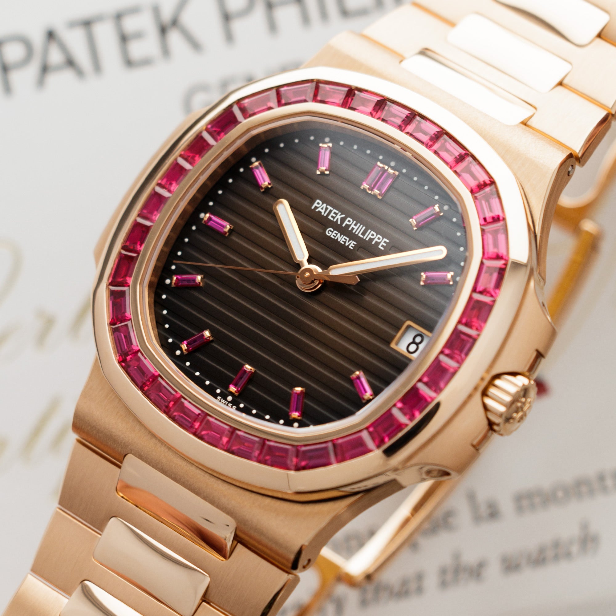 Patek Philippe - Patek Philippe Rose Gold Nautilus Watch Ref. 5723 with Factory Ruby Dial and Bezel - The Keystone Watches