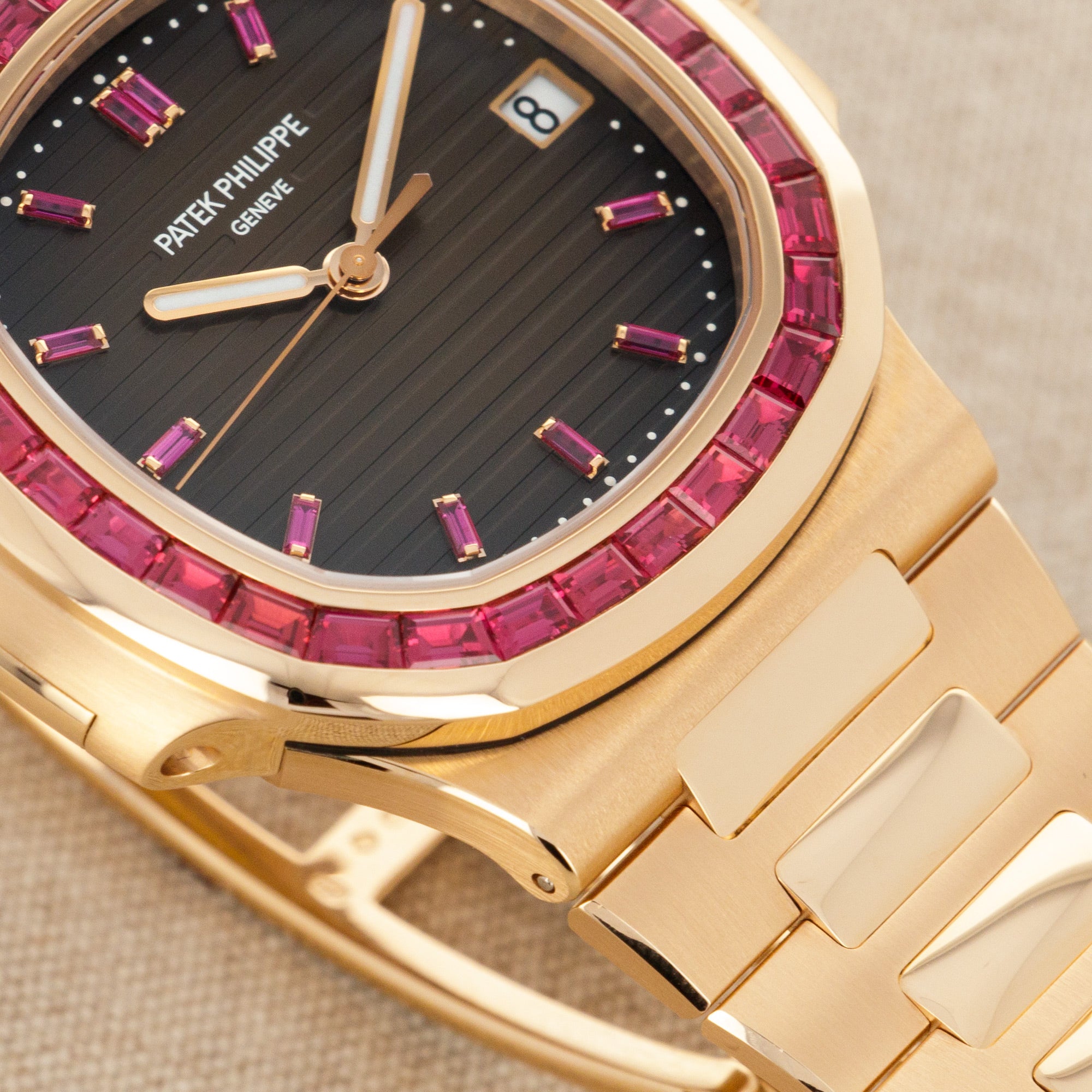 Patek Philippe - Patek Philippe Rose Gold Nautilus Watch Ref. 5723 with Factory Ruby Dial and Bezel - The Keystone Watches