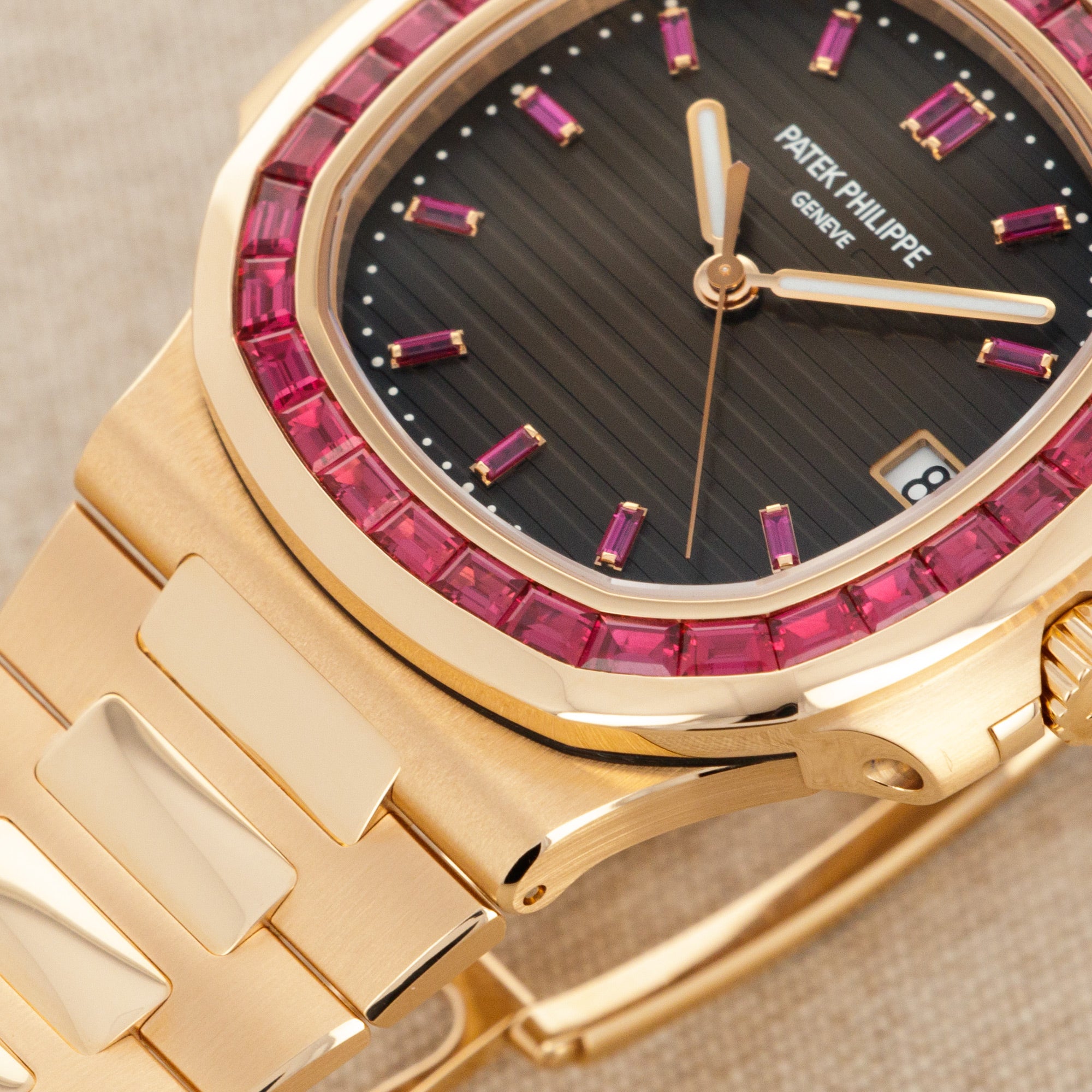 Patek Philippe - Patek Philippe Rose Gold Nautilus Watch Ref. 5723 with Factory Ruby Dial and Bezel - The Keystone Watches