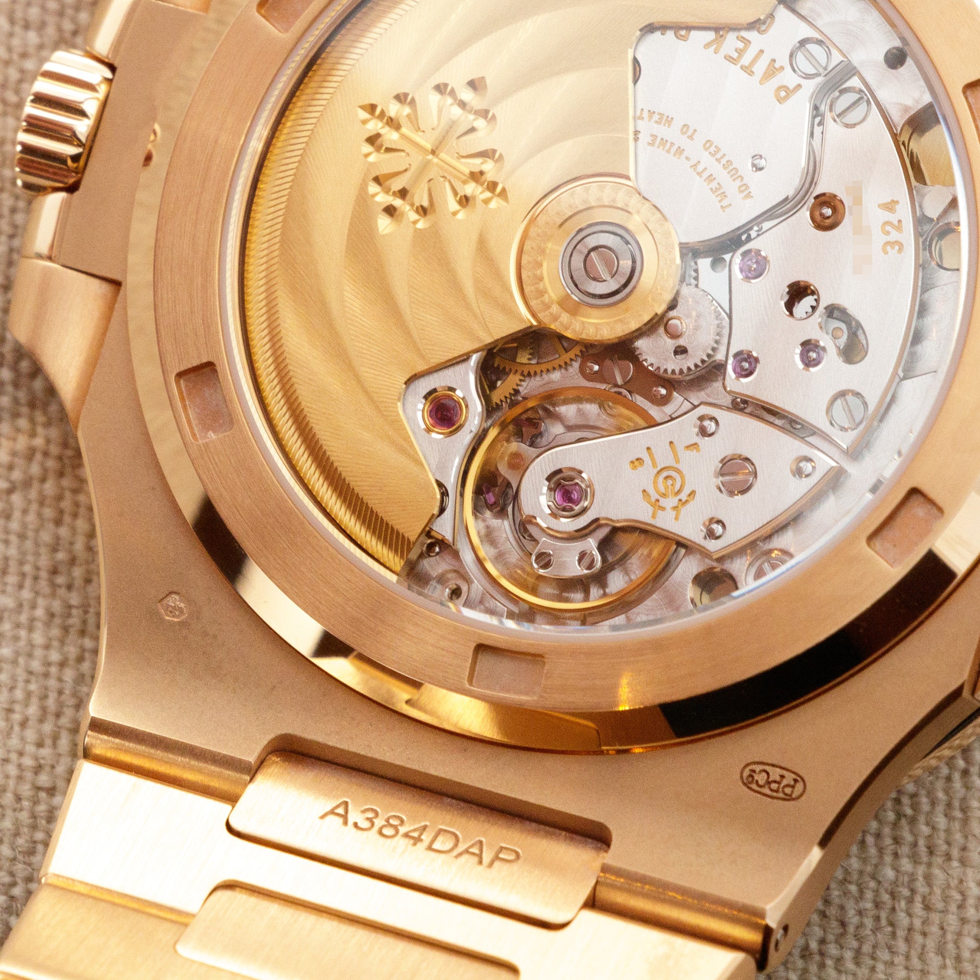 Patek Philippe - Patek Philippe Rose Gold Nautilus Watch Ref. 5723 with Factory Ruby Dial and Bezel - The Keystone Watches