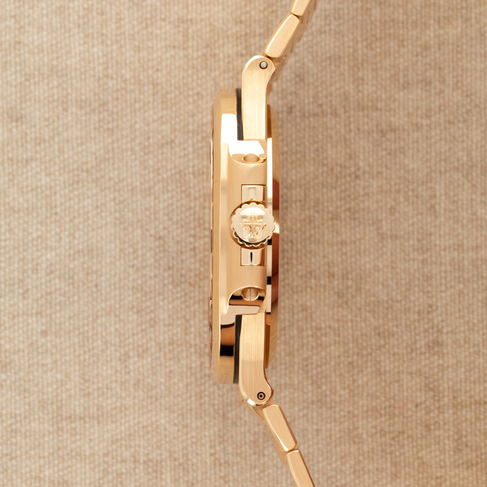 Patek Philippe - Patek Philippe Rose Gold Nautilus Watch Ref. 5723 with Factory Ruby Dial and Bezel - The Keystone Watches