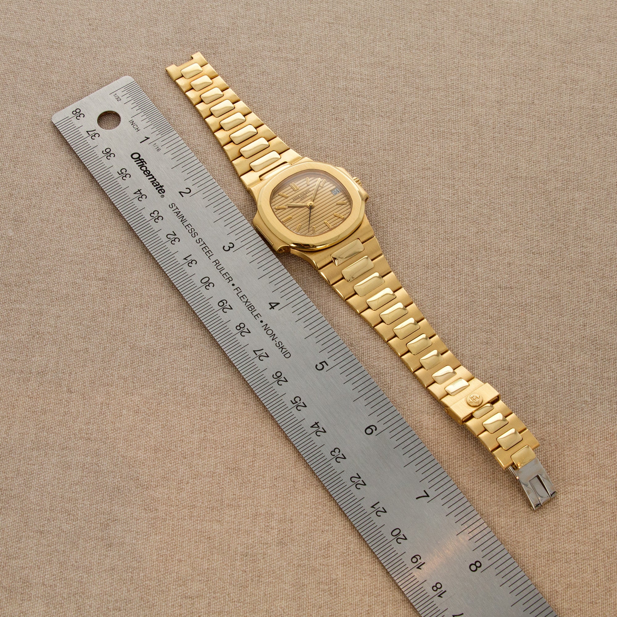 Patek Philippe - Patek Philippe Yellow Gold Nautilus Ref. 3800 with Original Warranty - The Keystone Watches