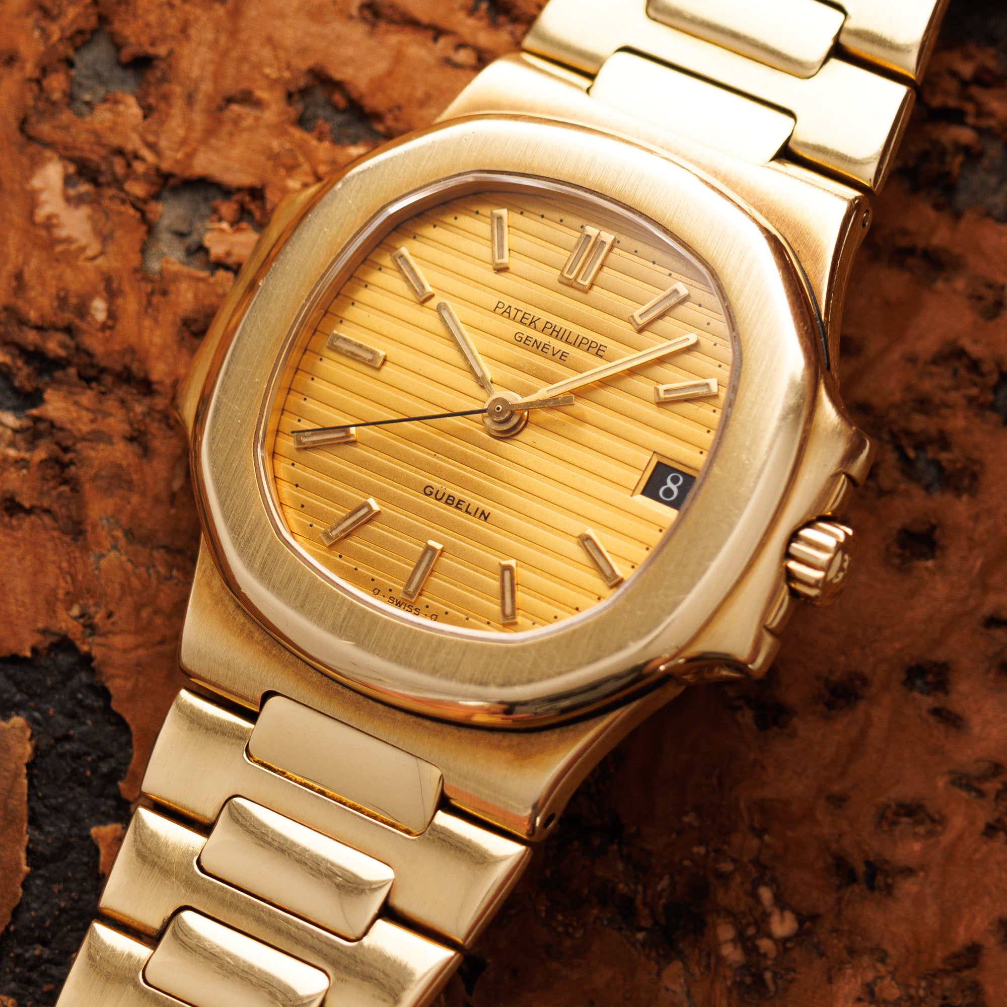 Patek Philippe - Patek Philippe Yellow Gold Nautilus Ref. 3800 Retailed by Gubelin - The Keystone Watches
