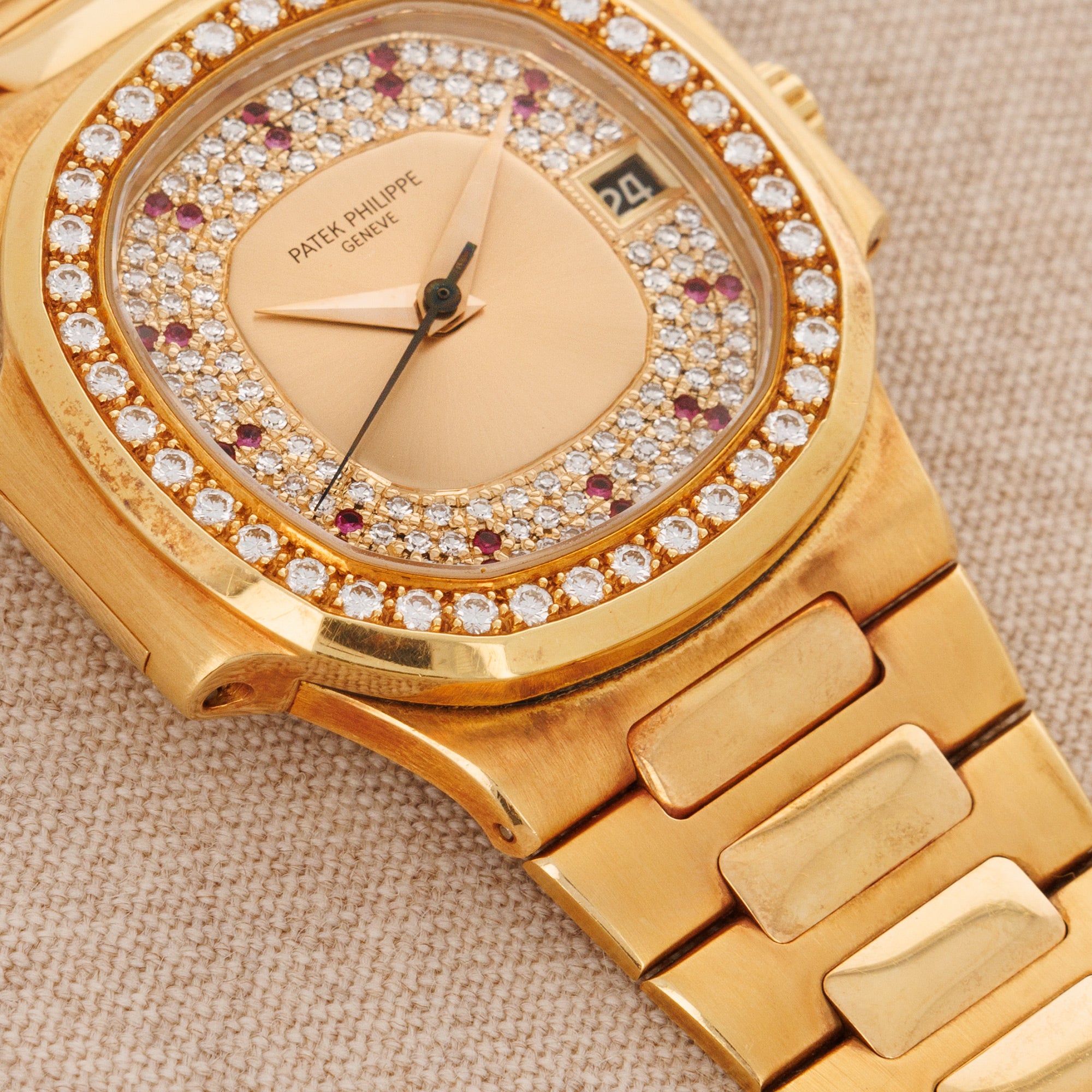 Patek Philippe - Patek Philippe Yellow Gold Nautilus Ref. 3800 with Factory Diamond and Ruby Dial - The Keystone Watches