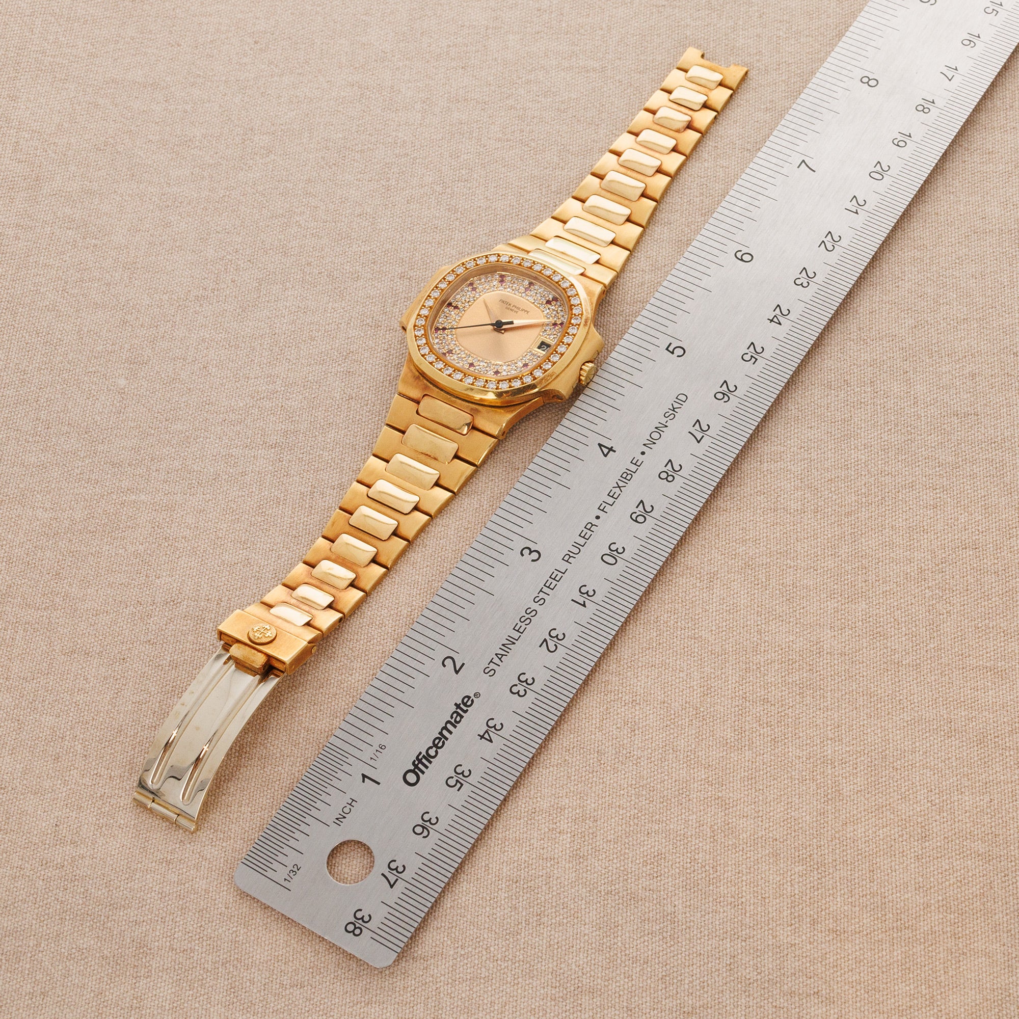 Patek Philippe - Patek Philippe Yellow Gold Nautilus Ref. 3800 with Factory Diamond and Ruby Dial - The Keystone Watches