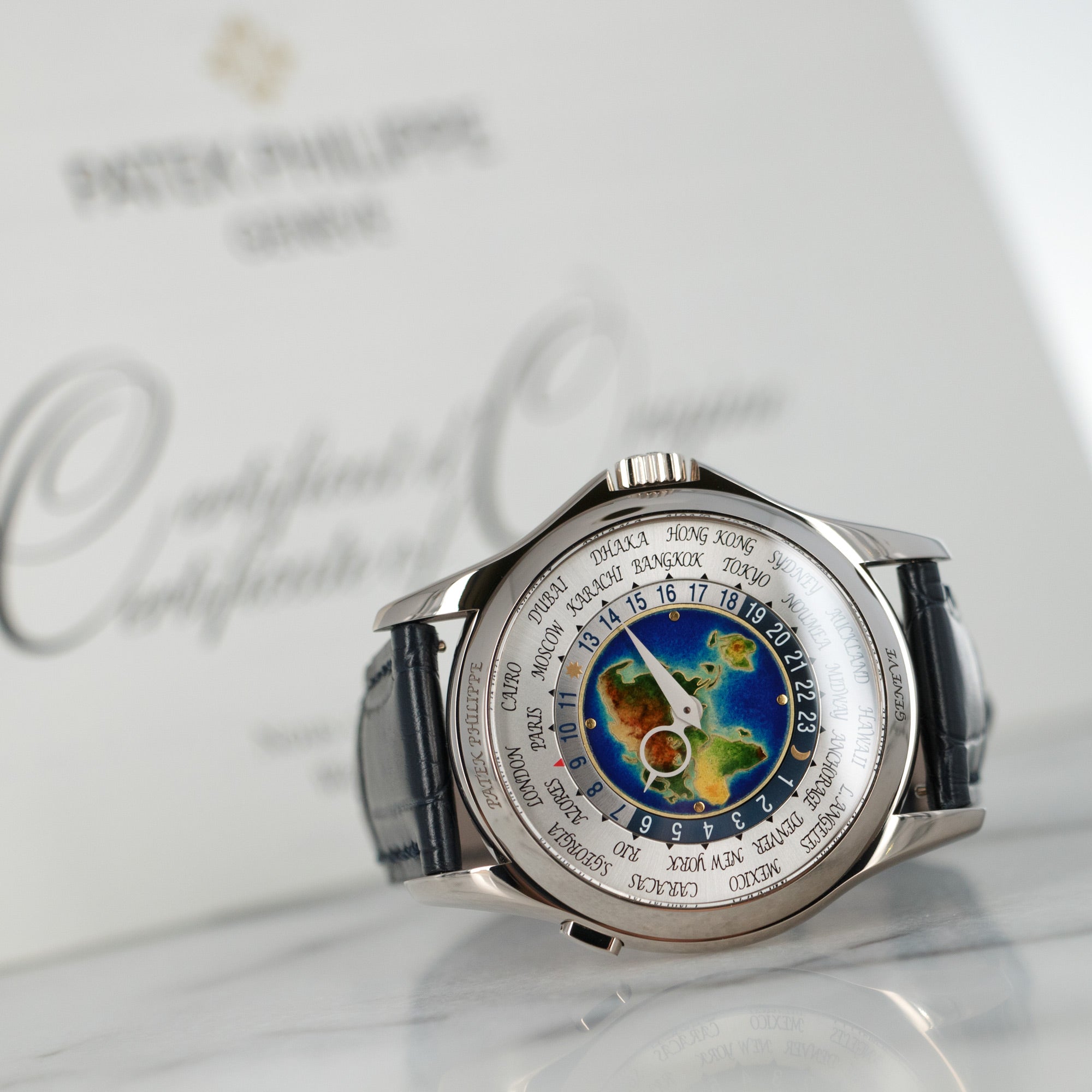 Patek Philippe - Patek Philippe White Gold World Time Cloisonne Watch Ref. 5131 - The Keystone Watches