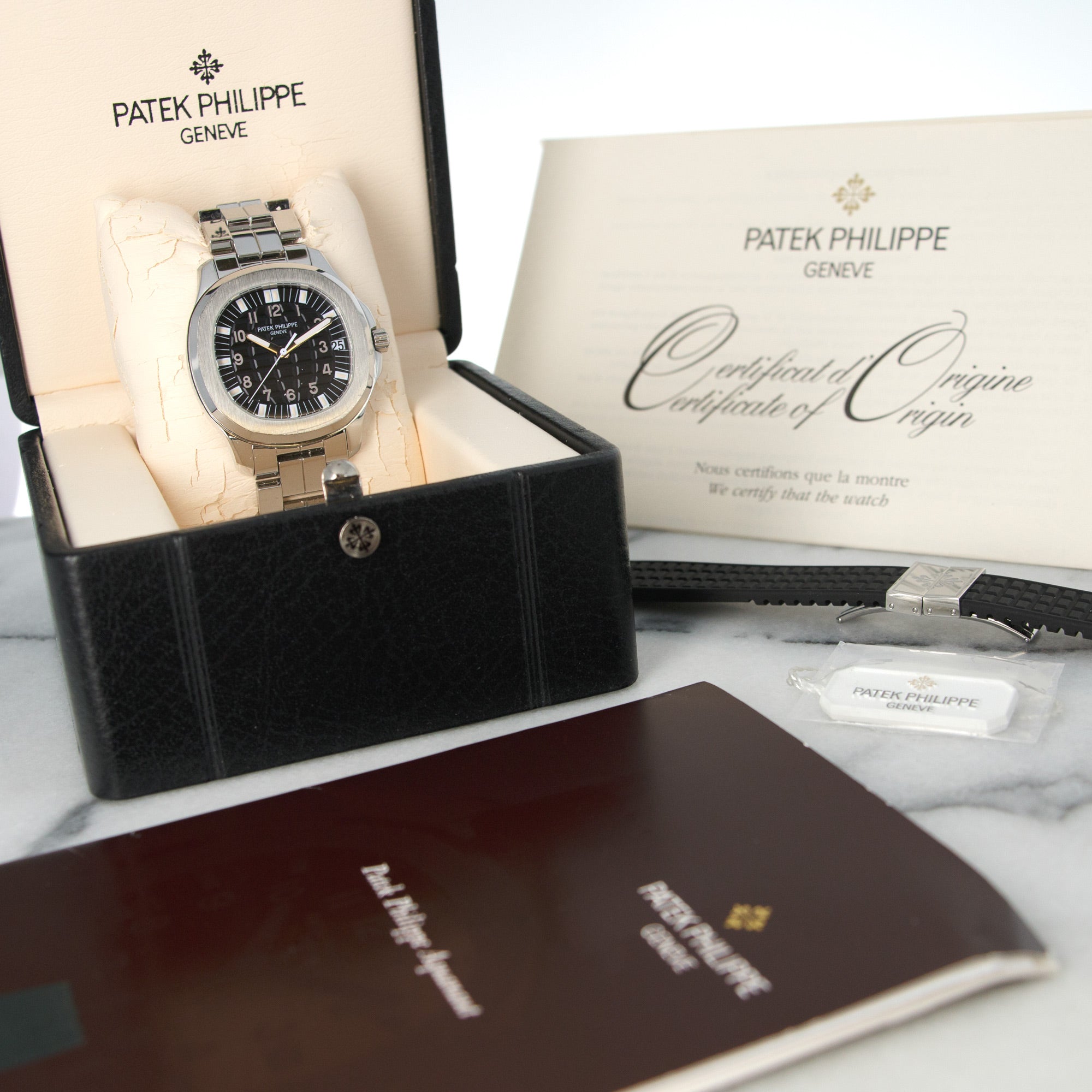 Patek Philippe - Patek Philippe Aquanaut Watch Ref. 5065 with Original Box, Papers, & Rubber Strap - The Keystone Watches