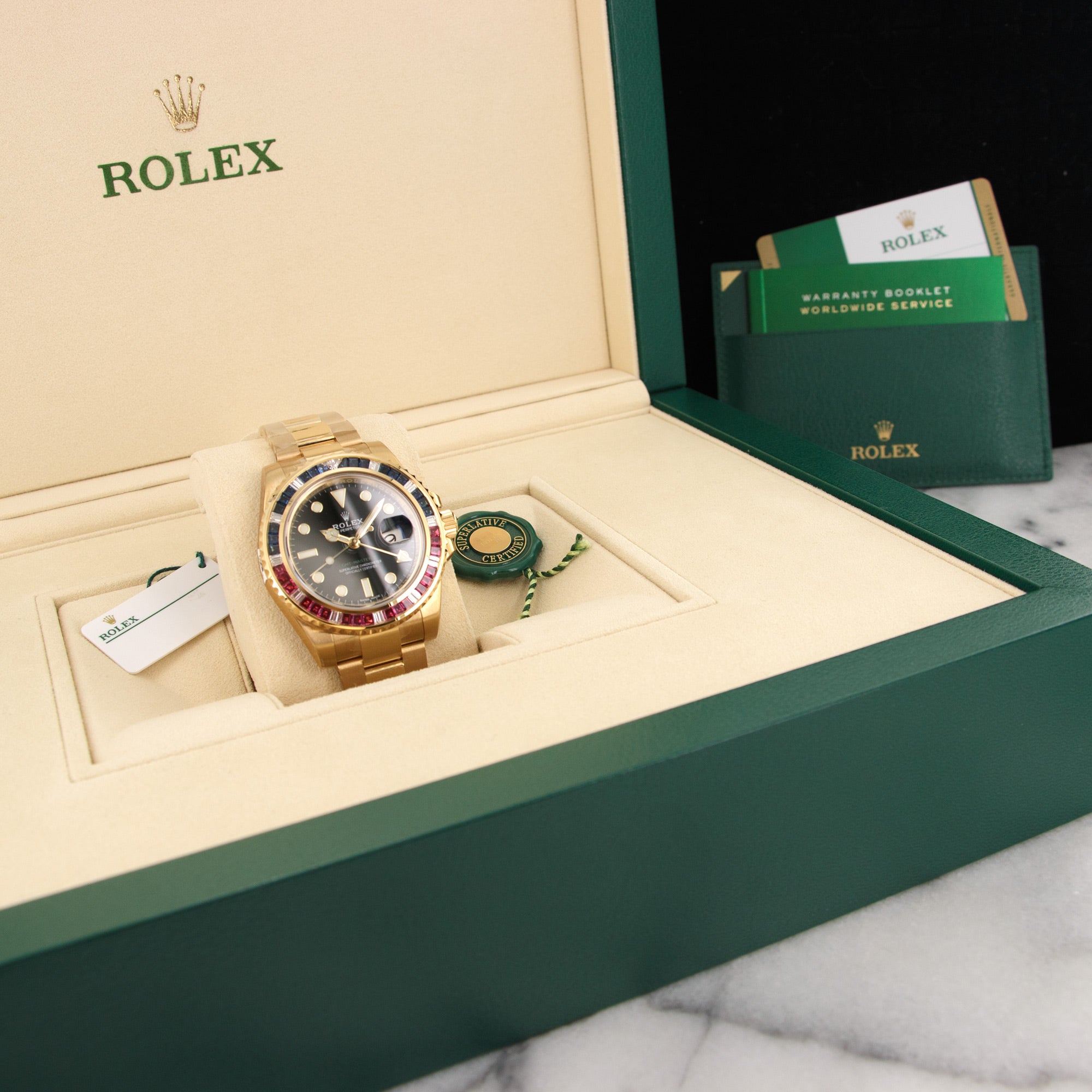 Rolex - Rolex Yellow Gold GMT-Master II Sapphire Ruby Watch Ref. 116748 in Unworn Condition - The Keystone Watches