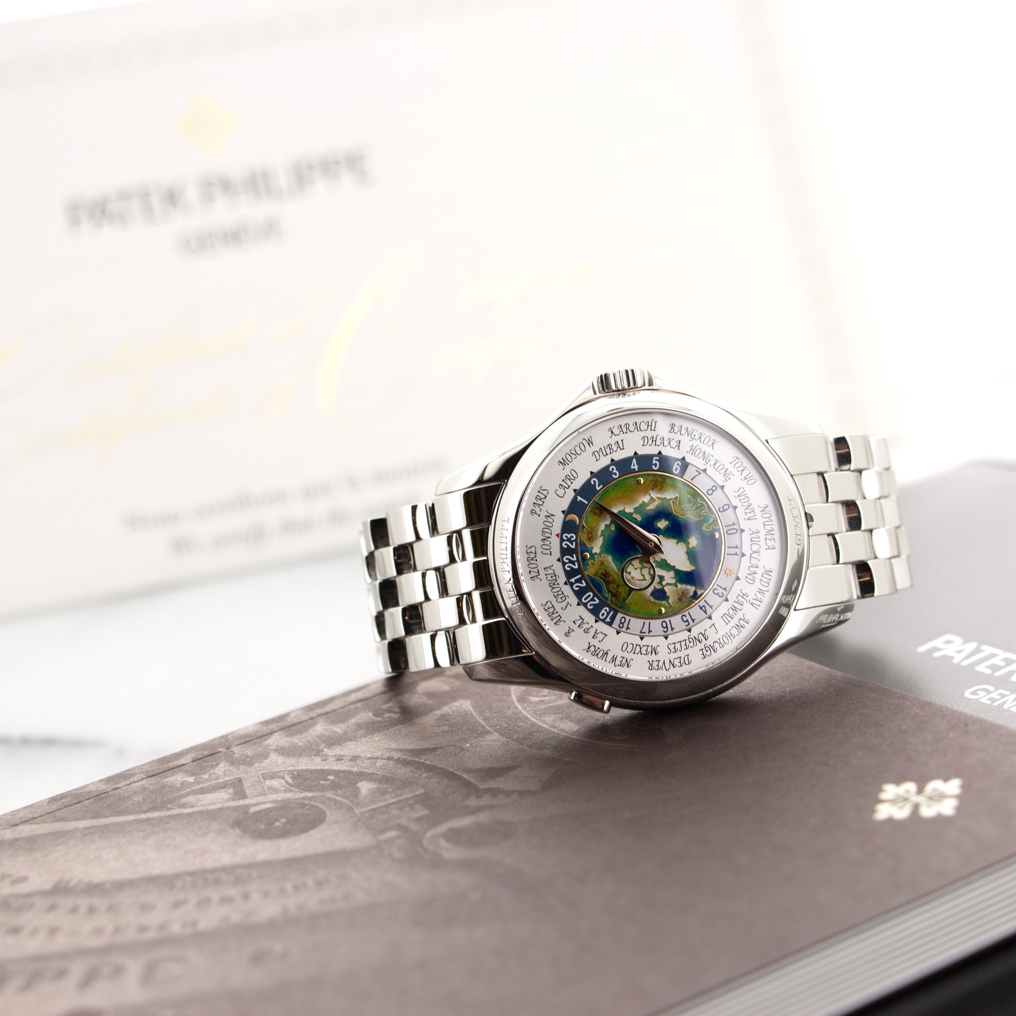 Patek Philippe - Patek Philippe Platinum World Time Cloisonne Watch Ref. 5131 - The Keystone Watches