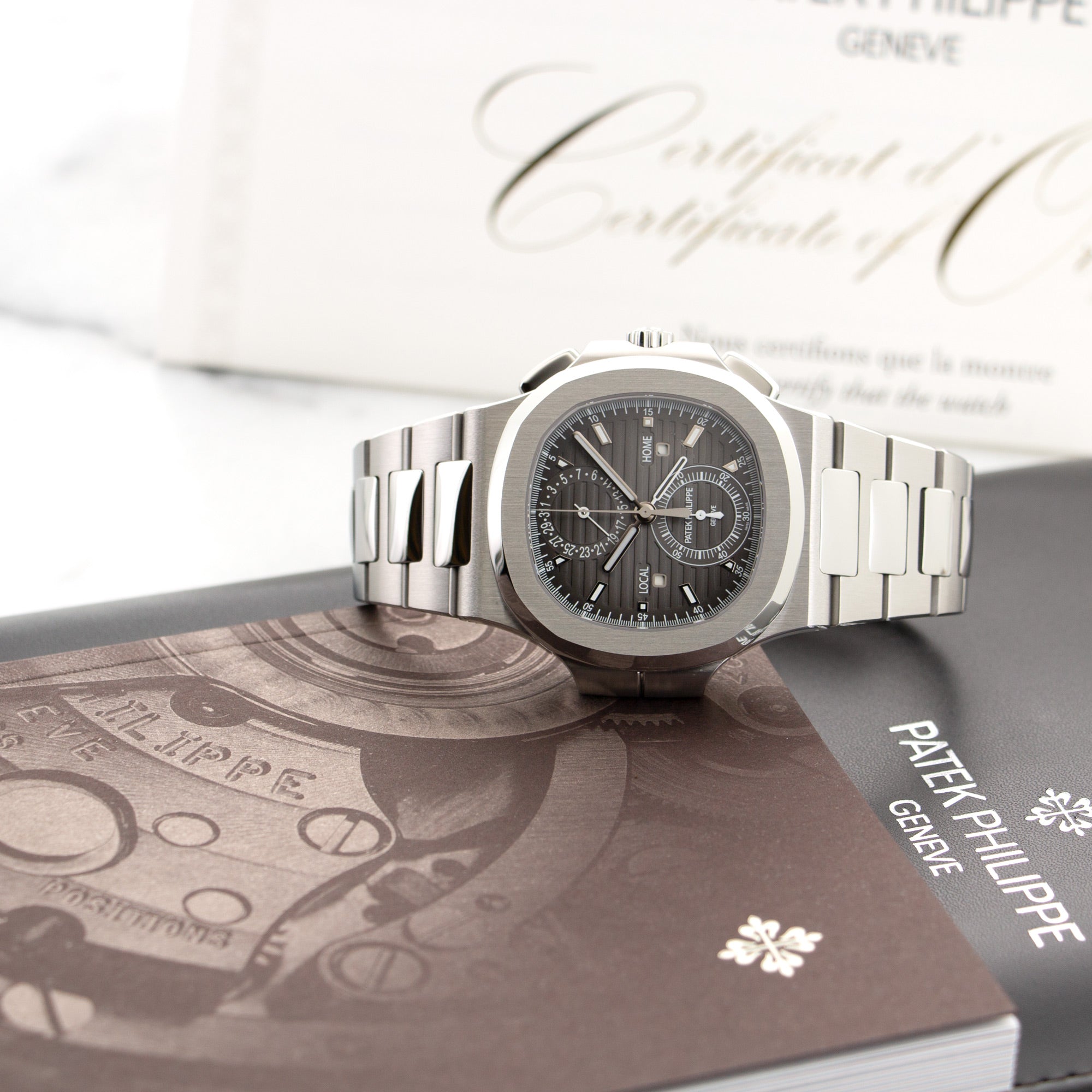 Patek Philippe - Patek Philippe Nautilus Travel Time Chronograph Watch Ref. 5990 - The Keystone Watches