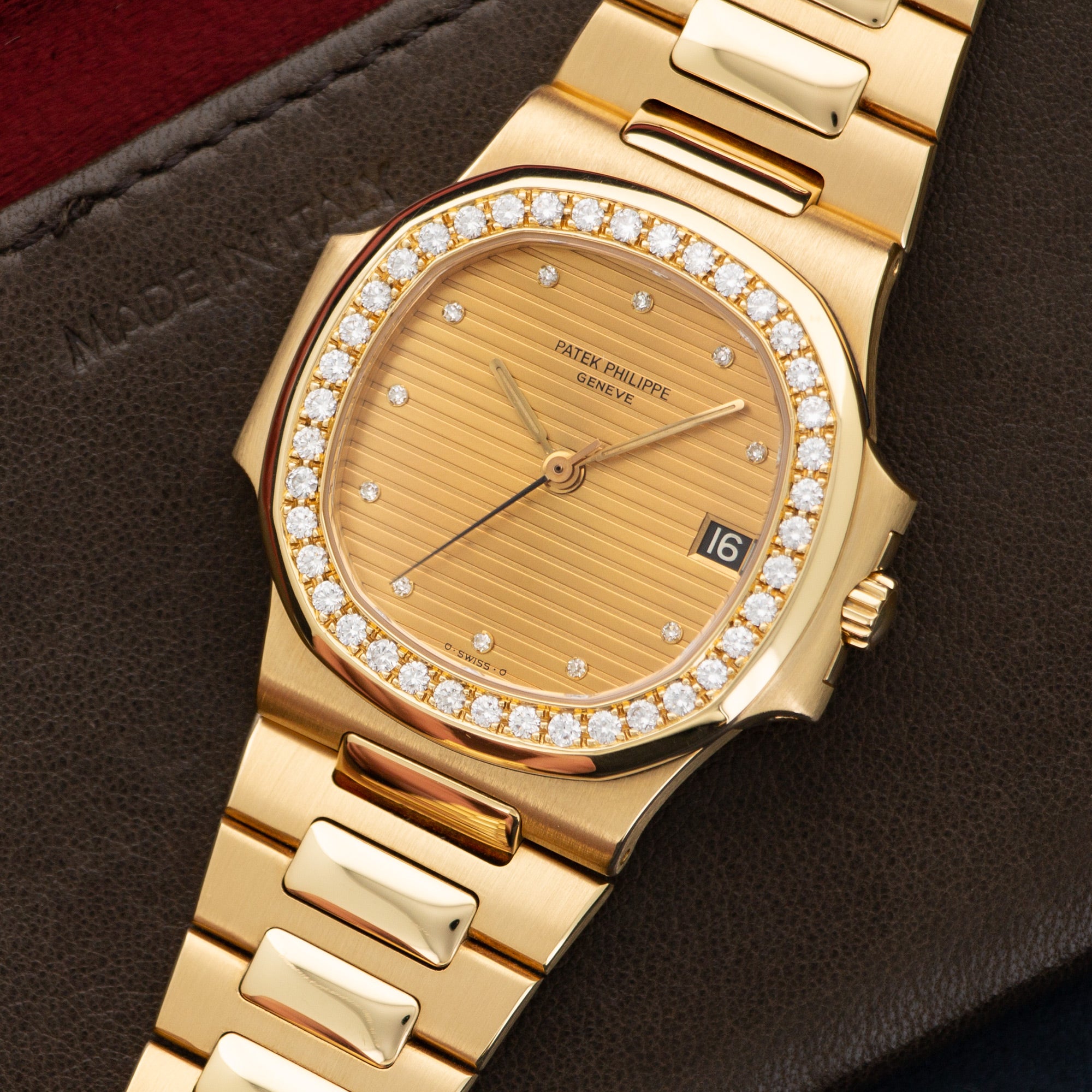 Patek Philippe - Patek Philippe Yellow Gold Nautilus Diamond Watch Ref. 3800 - The Keystone Watches