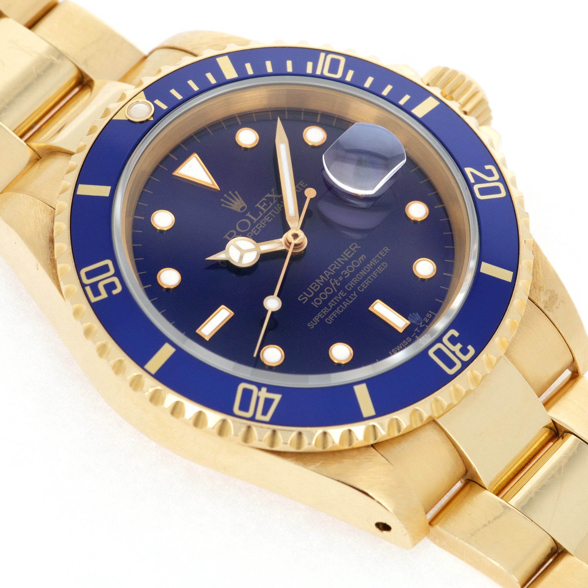 Rolex - Rolex Yellow Gold Submariner Ref. 16618 with Purple Hue Dial - The Keystone Watches