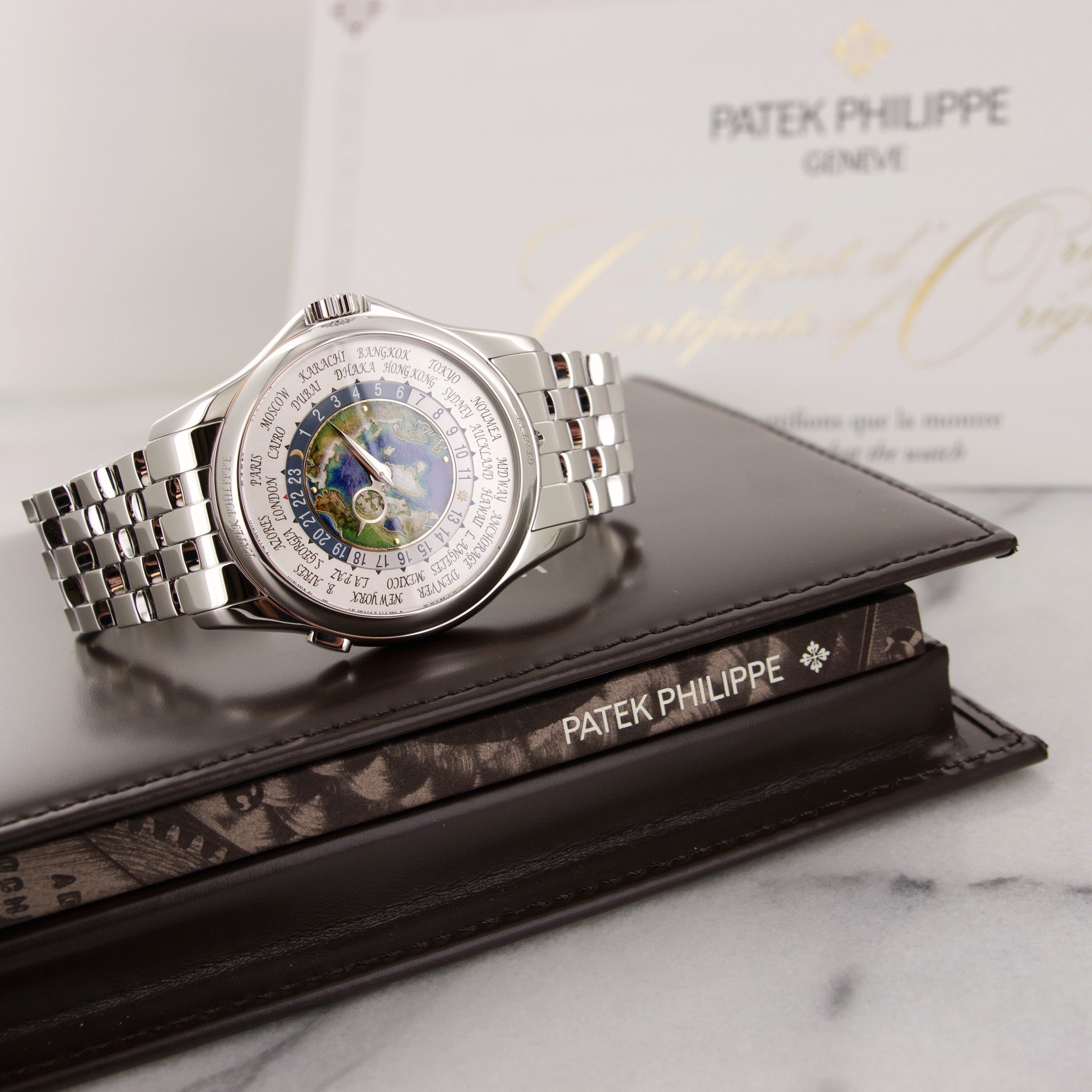 Patek Philippe - Patek Philippe Platinum World Time Cloisonne Watch Ref. 5131 - The Keystone Watches