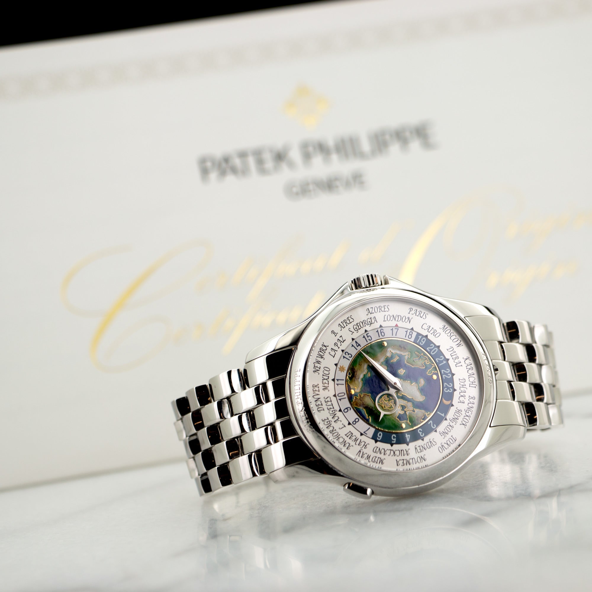 Patek Philippe - Patek Philippe Platinum World Time Cloisonne Watch Ref. 5131 - The Keystone Watches