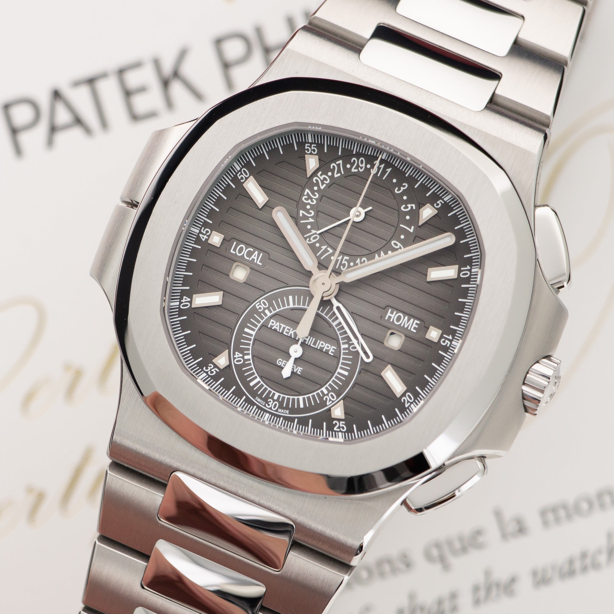 Patek Philippe - Patek Philippe Nautilus Travel Time Chronograph Watch Ref. 5990 - The Keystone Watches