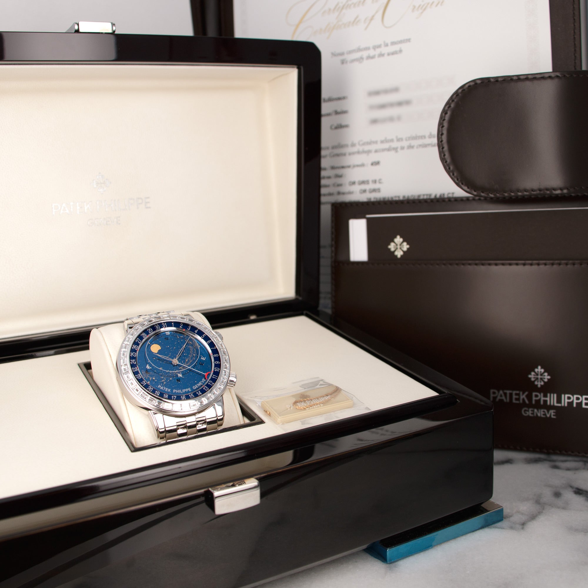 Patek Philippe - Patek Philippe White Gold Celestial Baguette Diamond Watch Ref. 6104 - The Keystone Watches