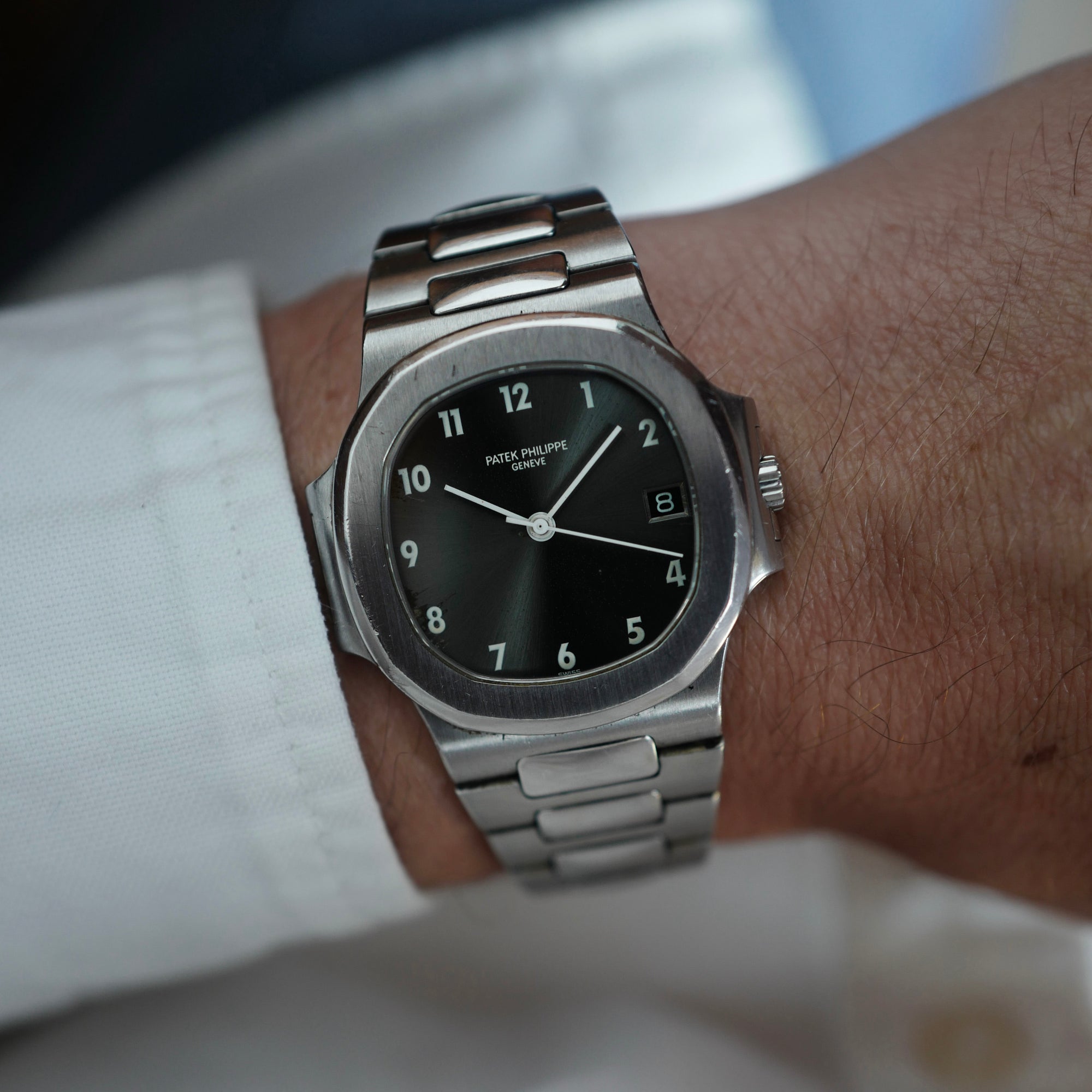 Patek Philippe Steel Nautilus Ref. 3800 with Rare Arabic Numeral Dial and Original Warranty