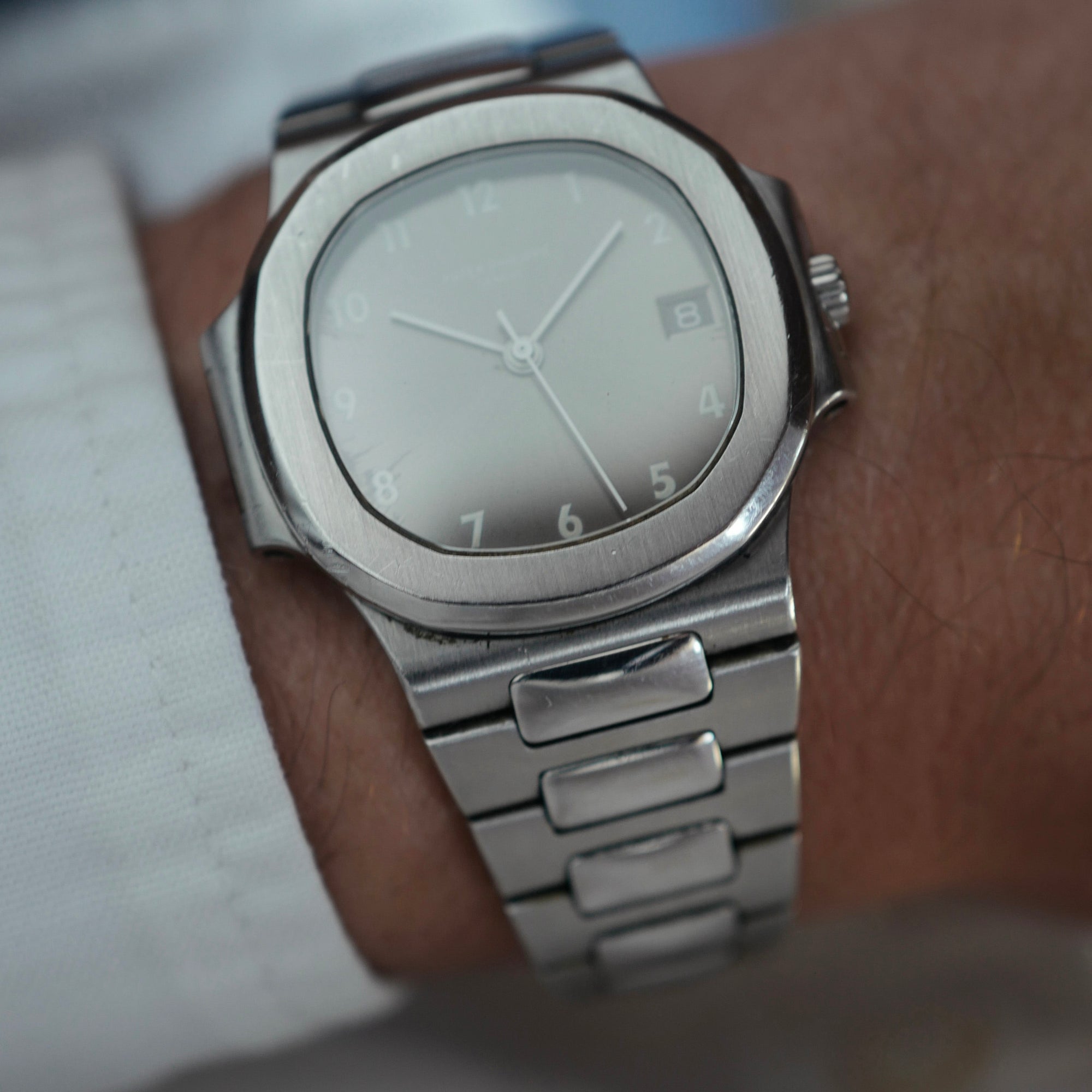 Patek Philippe Steel Nautilus Ref. 3800 with Rare Arabic Numeral Dial and Original Warranty