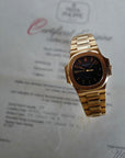 Patek Philippe Yellow Gold Nautilus Watch Ref. 3800 retailed by Gubelin  in Top Condition