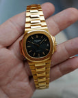 Patek Philippe Yellow Gold Nautilus Watch Ref. 3800 retailed by Gubelin  in Top Condition