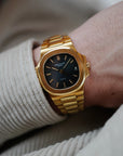 Patek Philippe Yellow Gold Nautilus Watch Ref. 3800 retailed by Gubelin  in Top Condition