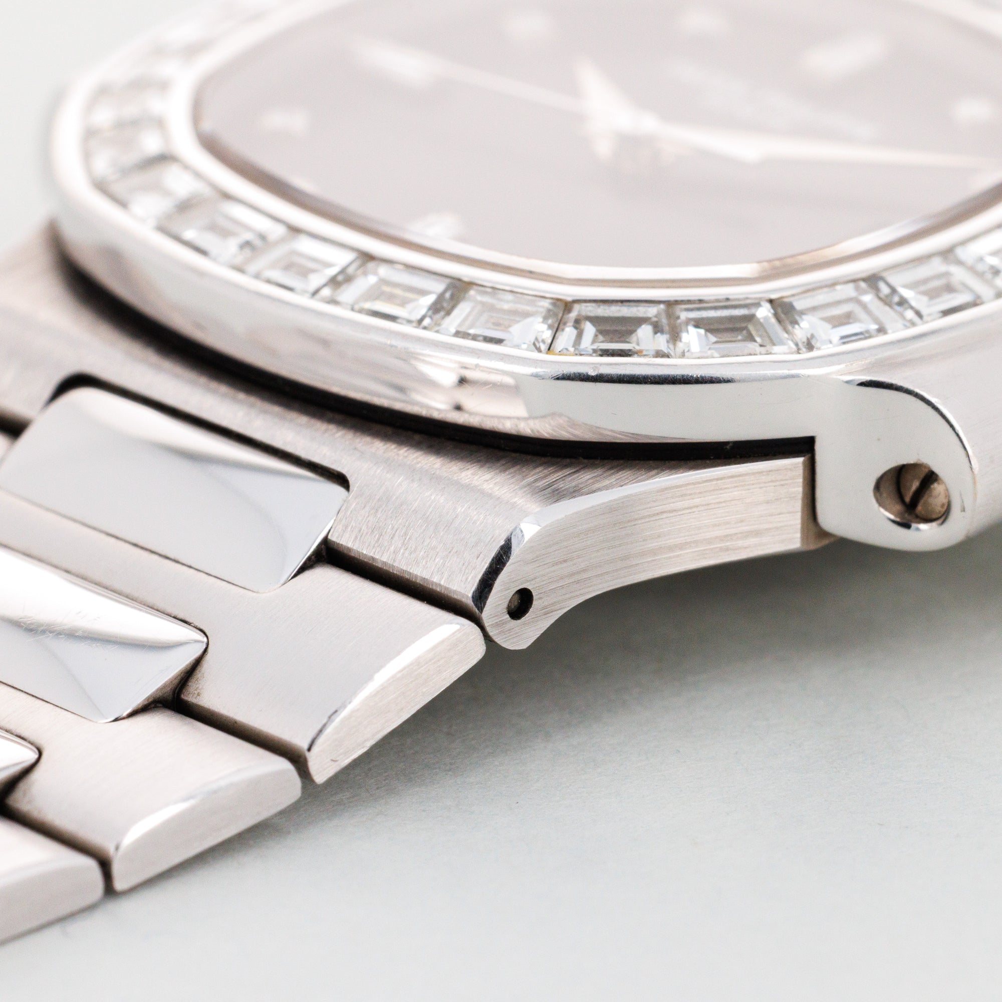 Patek Philippe White Gold Nautilus Watch Ref. 3800/130 with Baguette Diamond Bezel