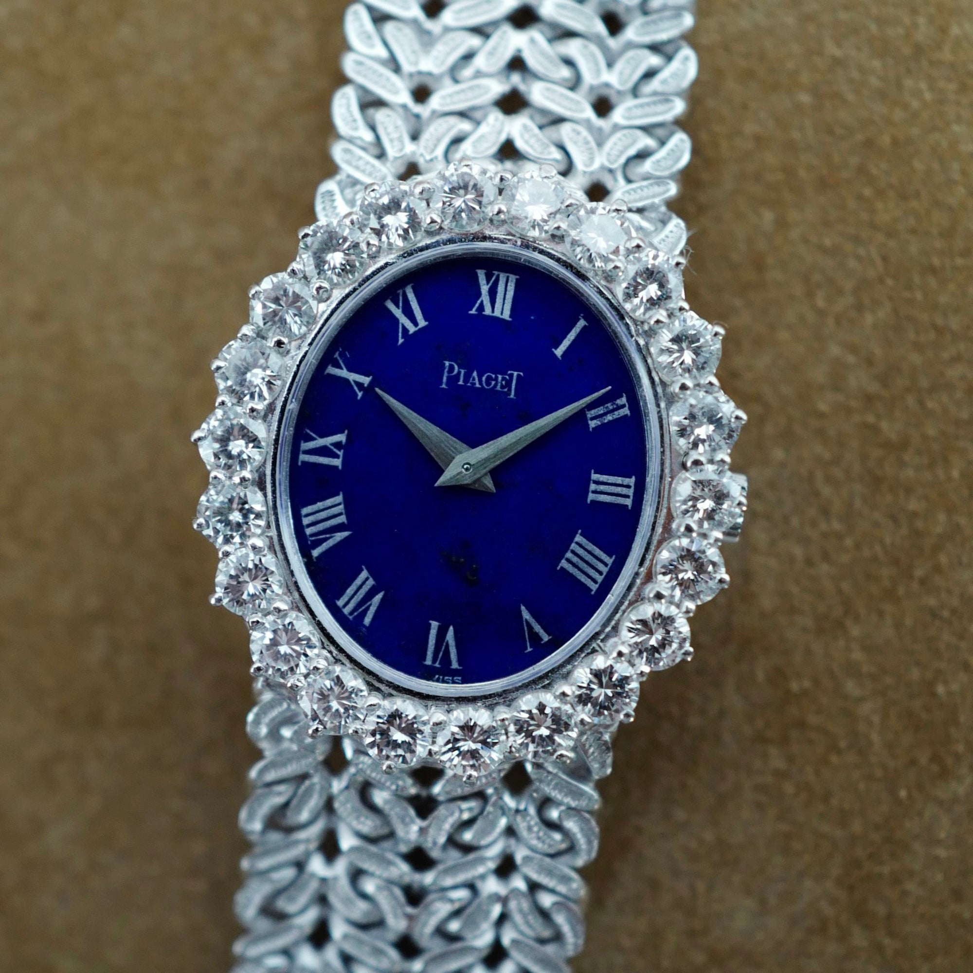 Piaget - Piaget White Gold Ladies Lapis Dial Diamond Bezel Watch Ref. 9338 - The Keystone Watches