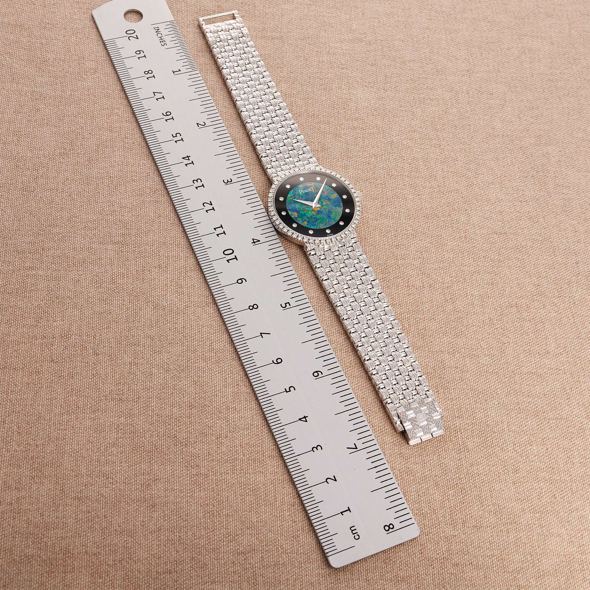 Piaget - Piaget White Gold Round Watch Ref. 9066D23 with Opal, Onyx and Diamond Dial - The Keystone Watches