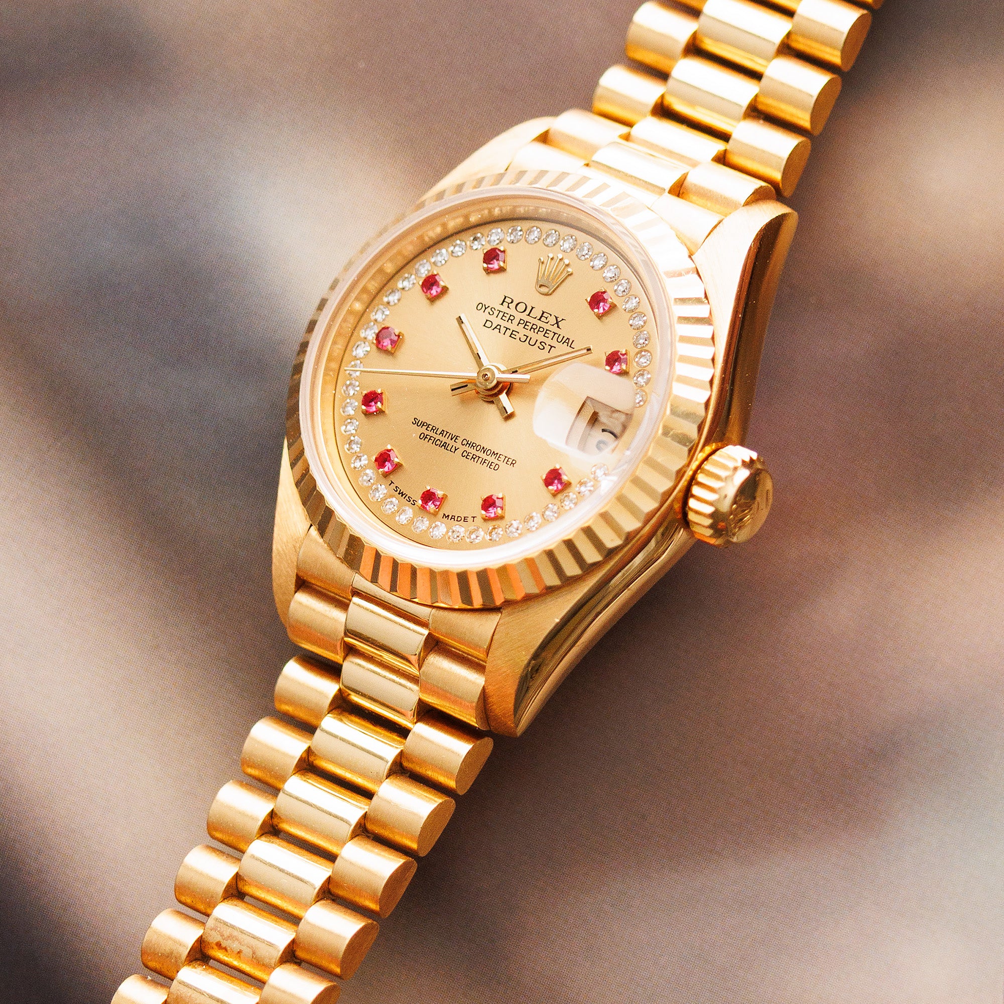 Rolex Yellow Gold Datejust Ref. 69178 with Ruby and Diamond String Dial