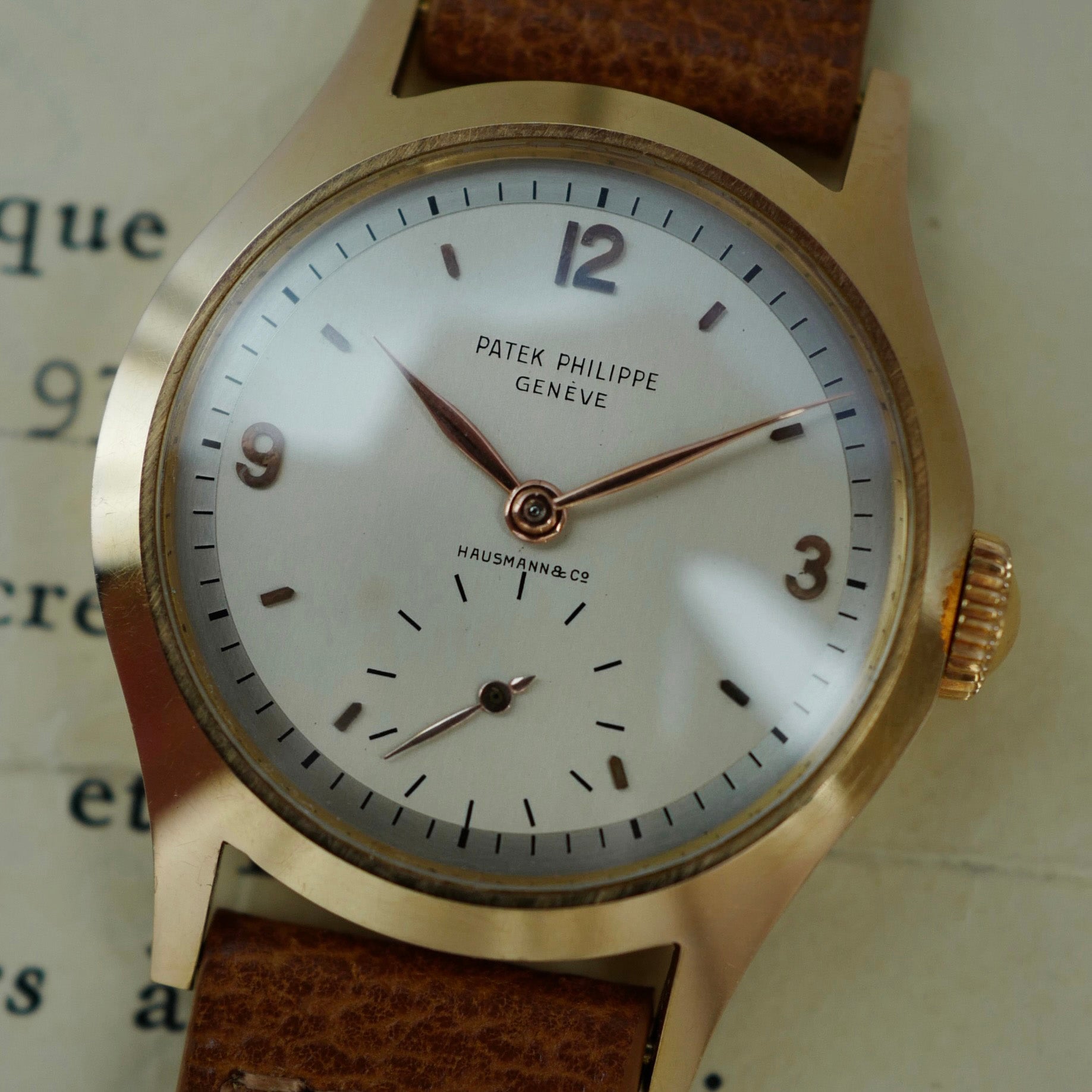 Patek Philippe 565 Retailed by Hausmann &amp; Co. with Original Certificate from 1953