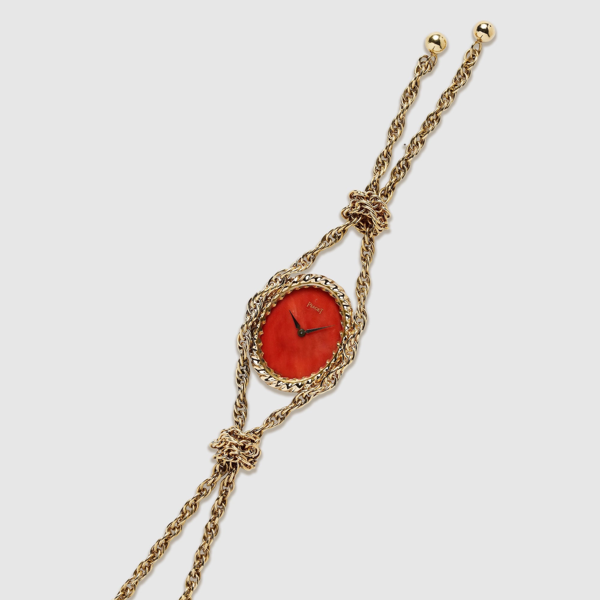 Piaget Yellow Gold Pendent with Coral Dial