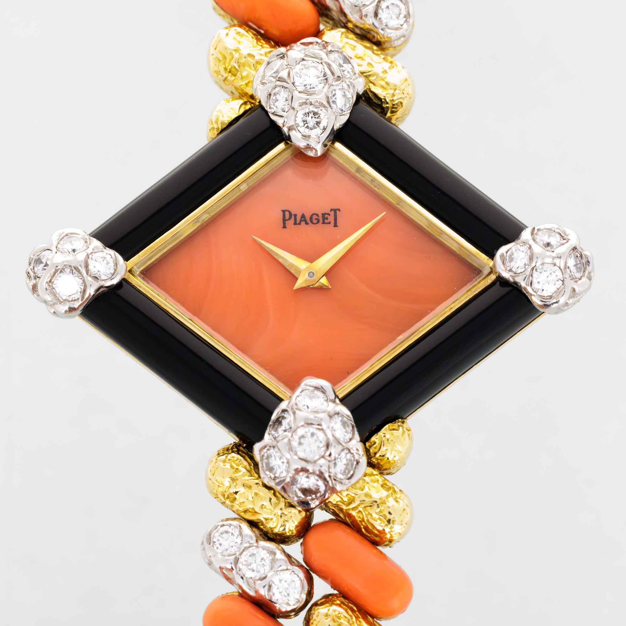Piaget Yellow Gold Coral, Onyx, Diamond Watch, Circa 1970s
