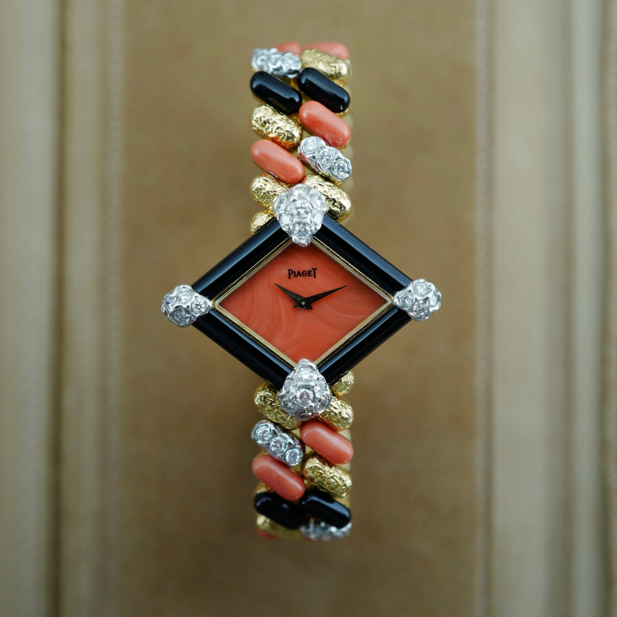 Piaget Yellow Gold Coral, Onyx, Diamond Watch, Circa 1970s