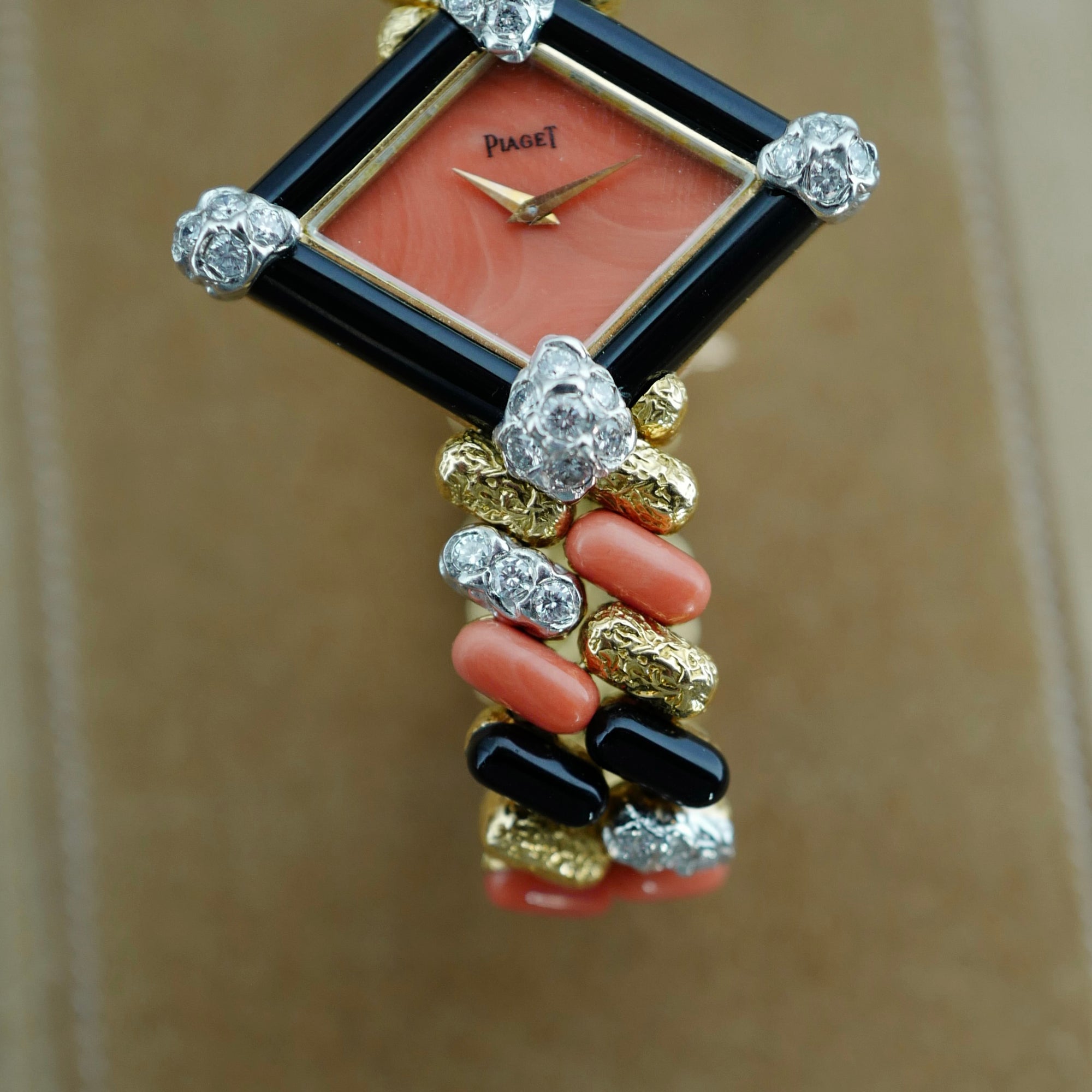 Piaget Yellow Gold Coral, Onyx, Diamond Watch, Circa 1970s